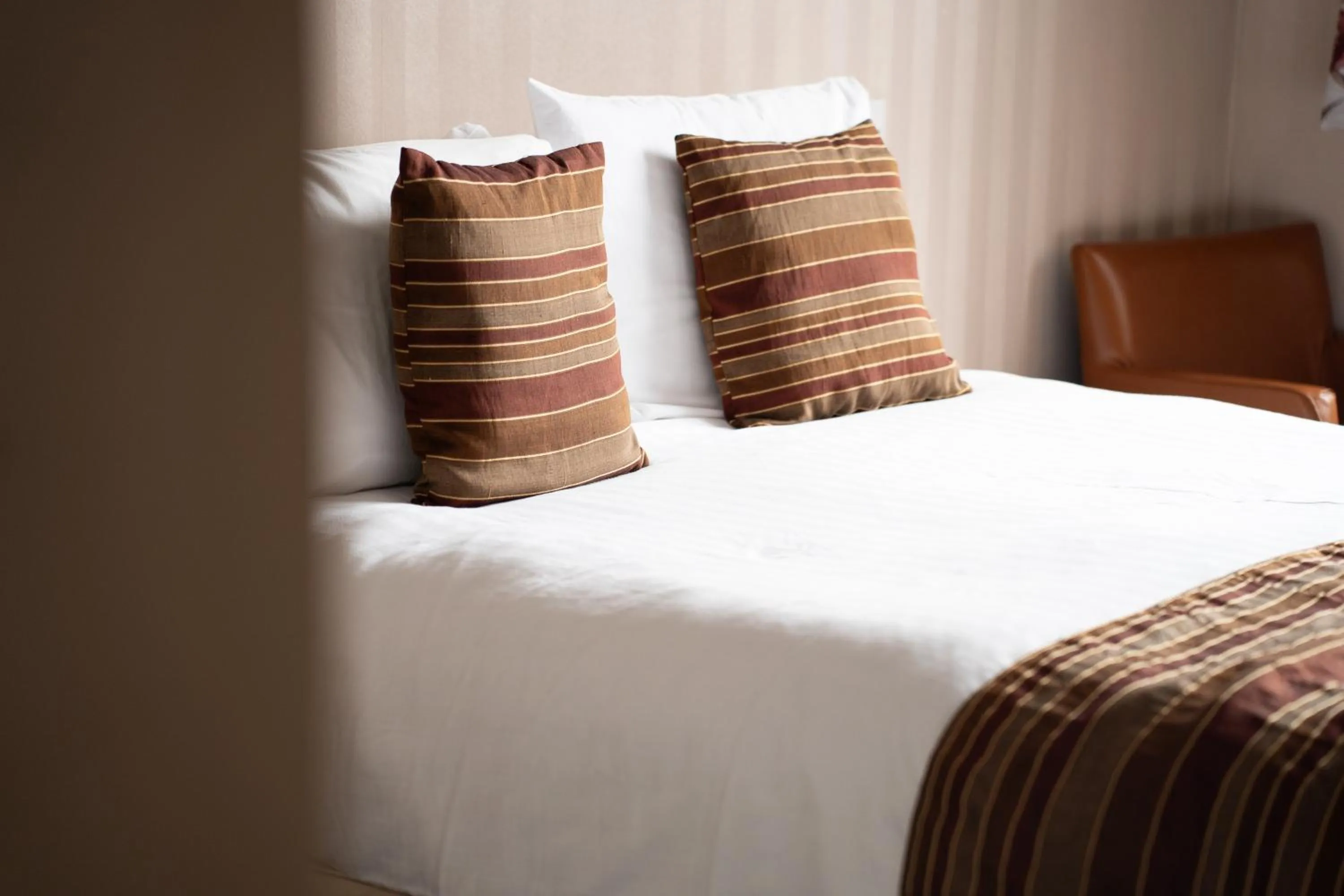 Bed in The Fenwick Hotel