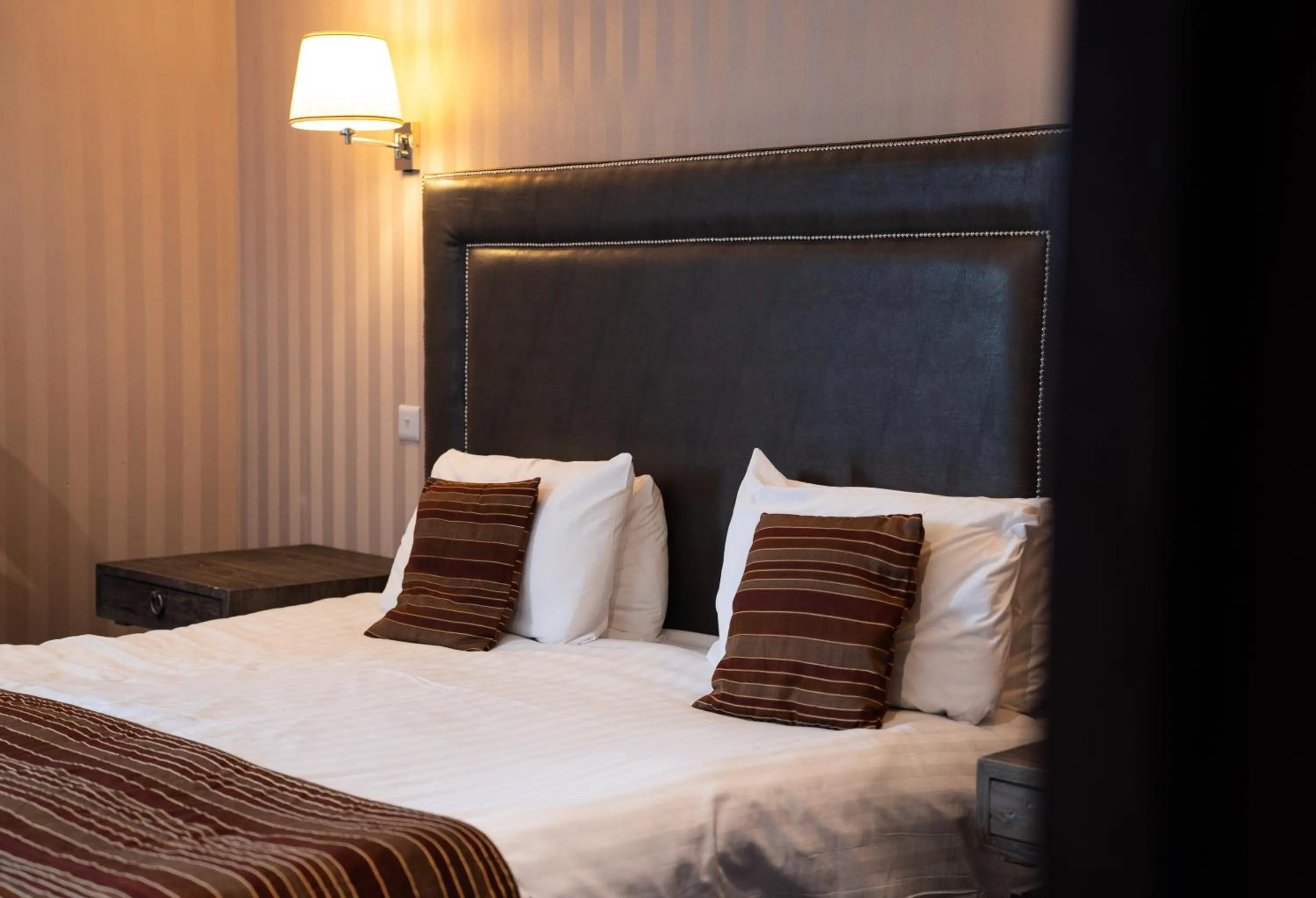 Bed in The Fenwick Hotel