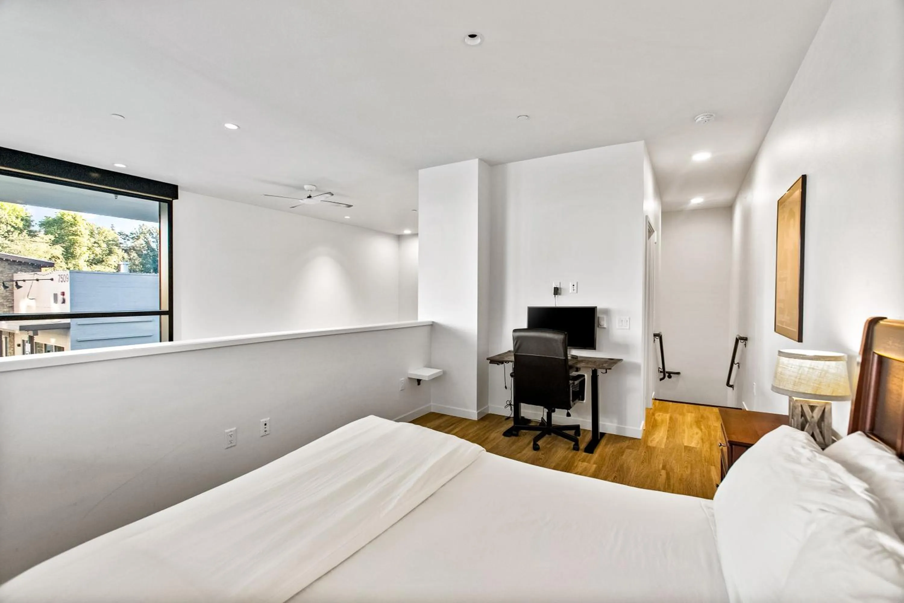 Bedroom, Bed in Airy and Open Corner Loft - 92 Walkscore