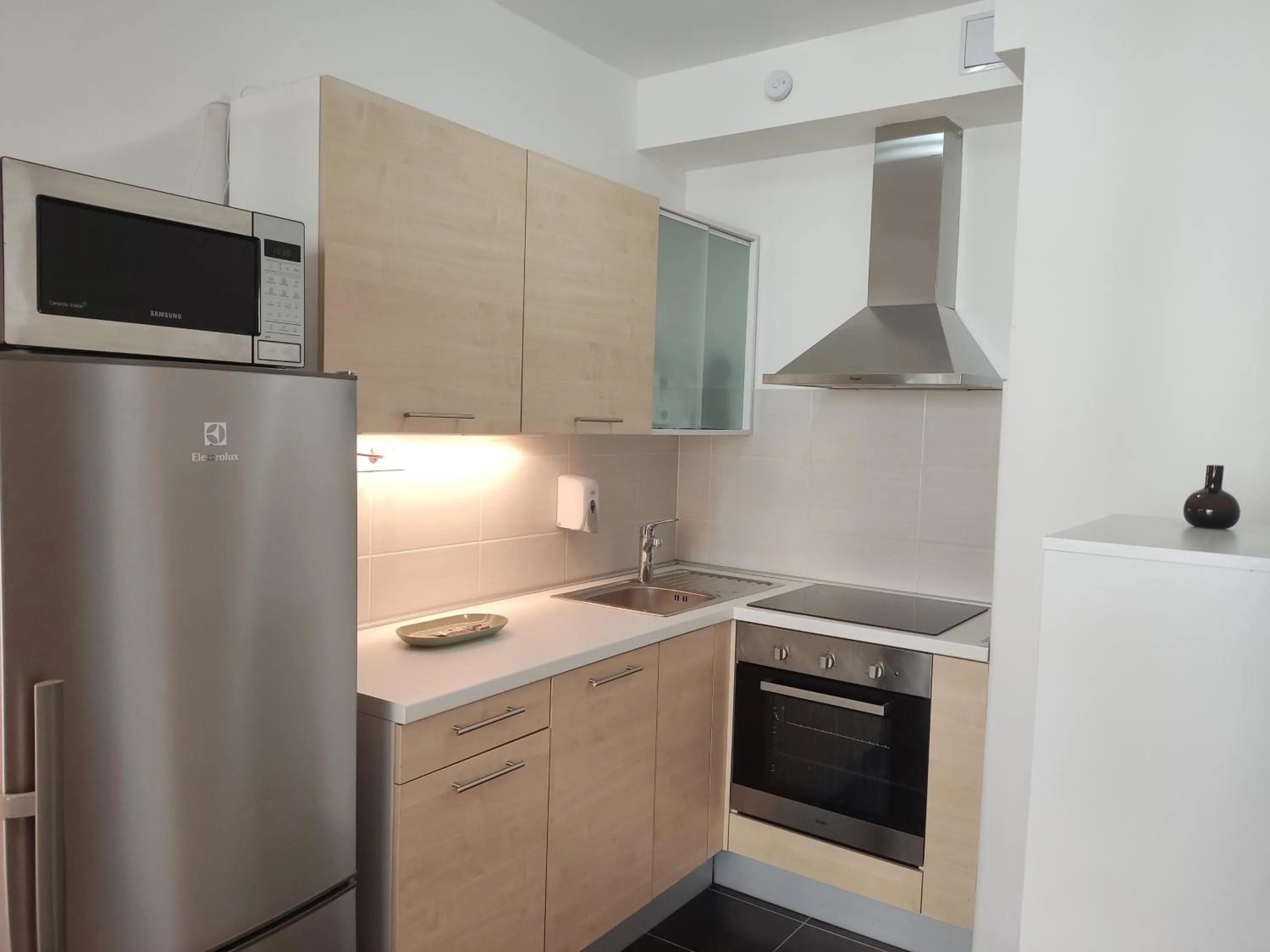 kitchen in Corvin Center Suites