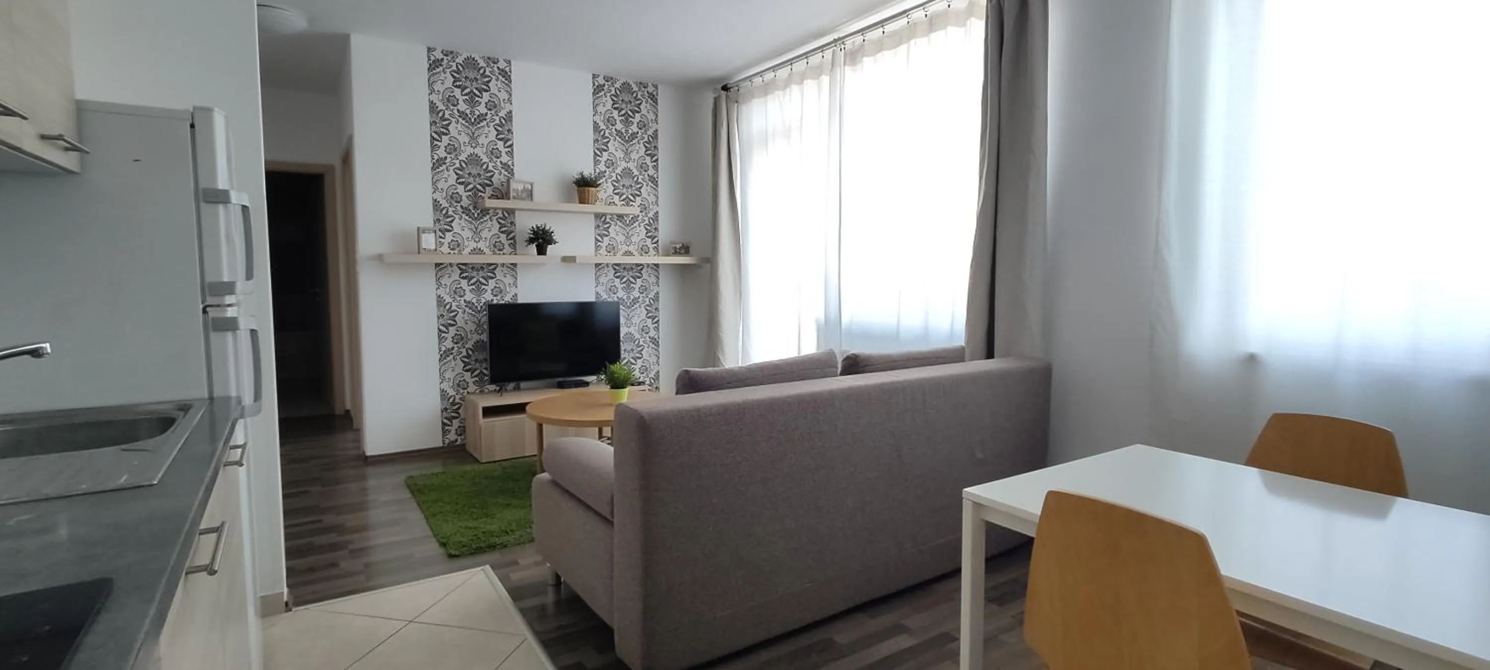 Living room in Corvin Center Suites