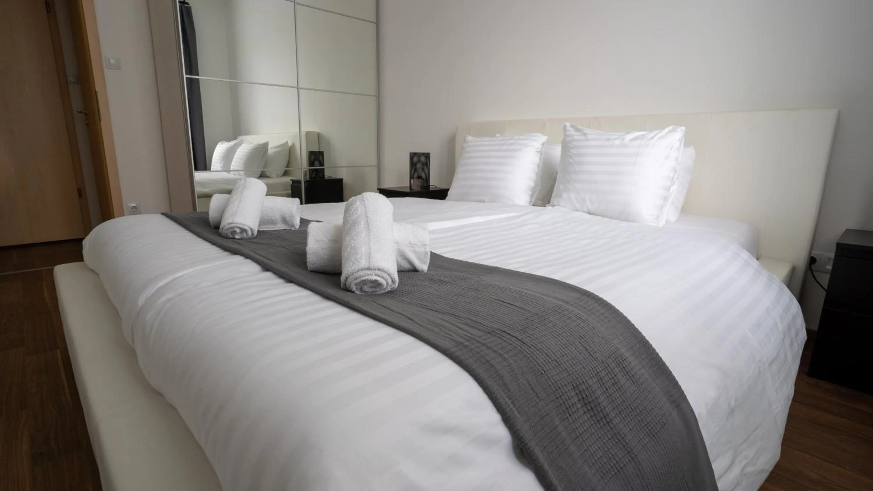 Bedroom, Bed in Corvin Center Suites