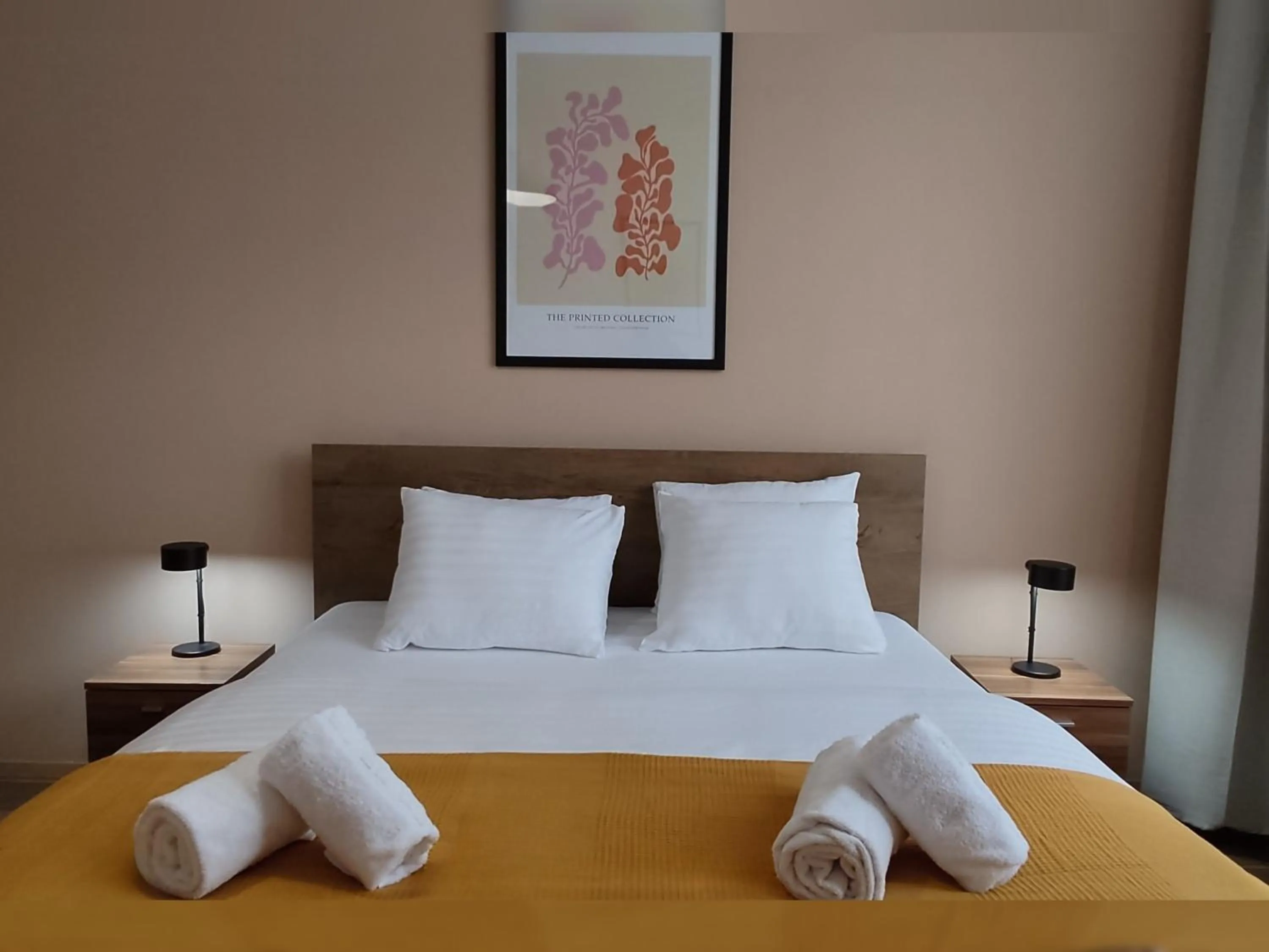 Bedroom, Bed in Corvin Center Suites