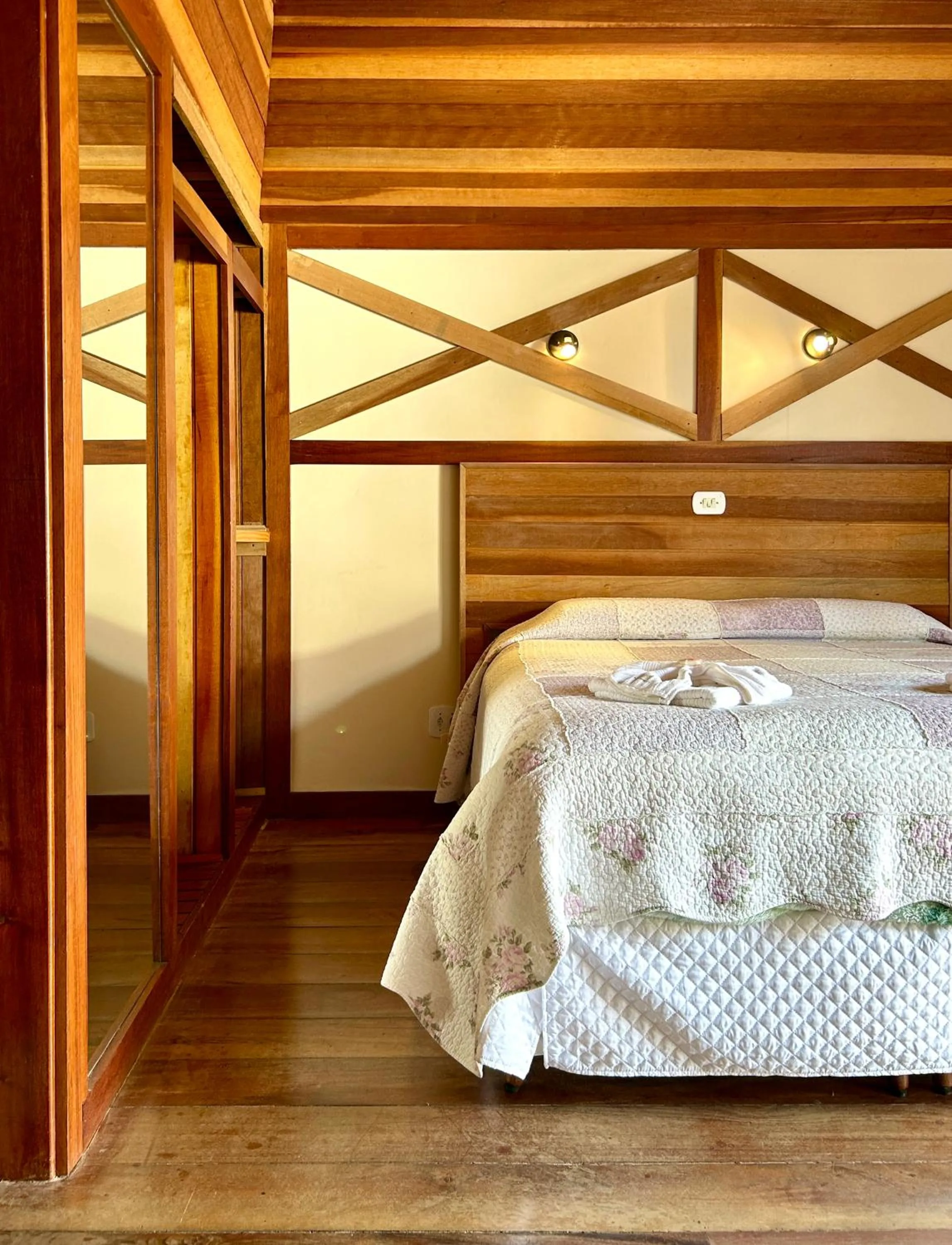 Bed in Pousada dos Esquilos