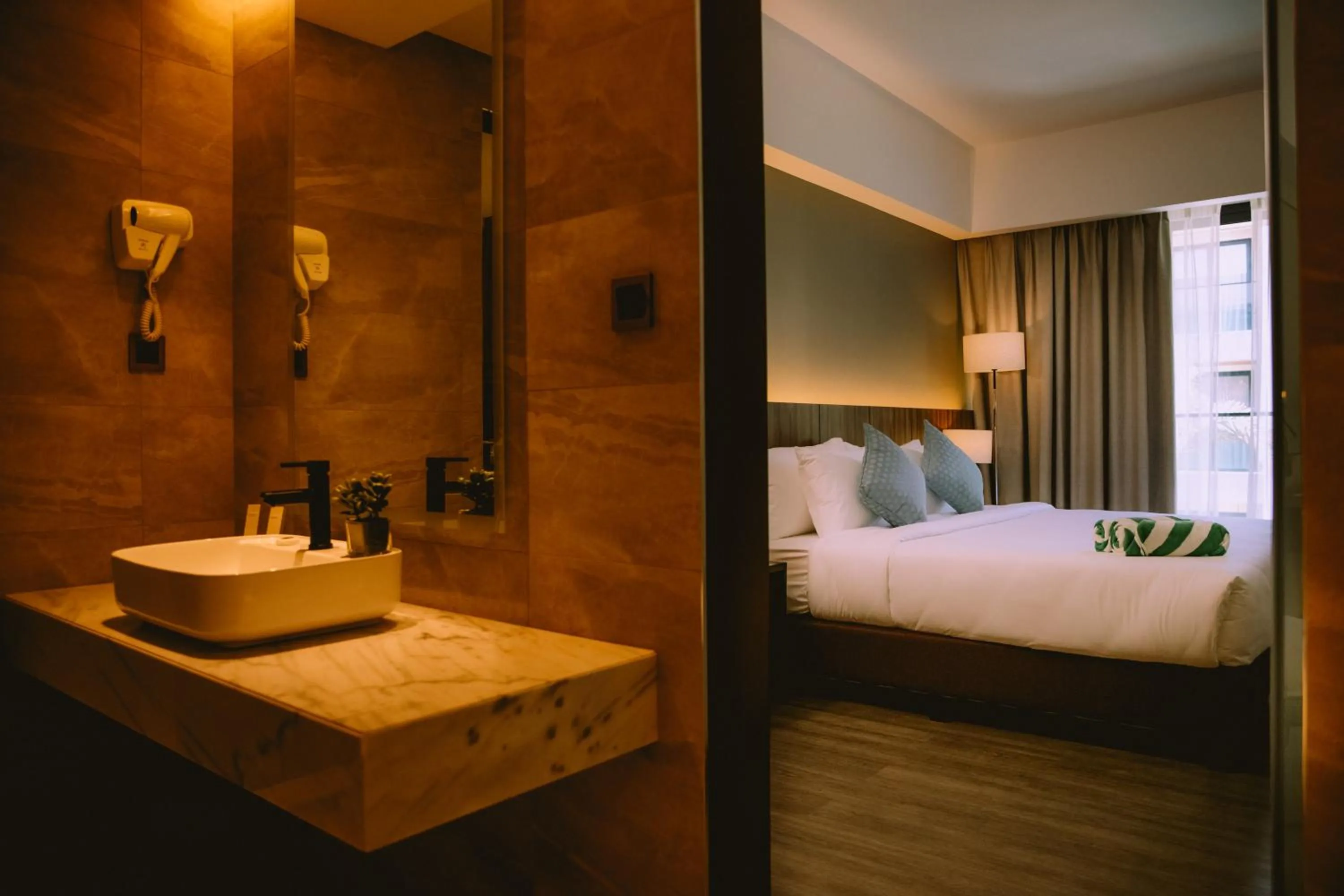 Bed in The Maximilian Hotel