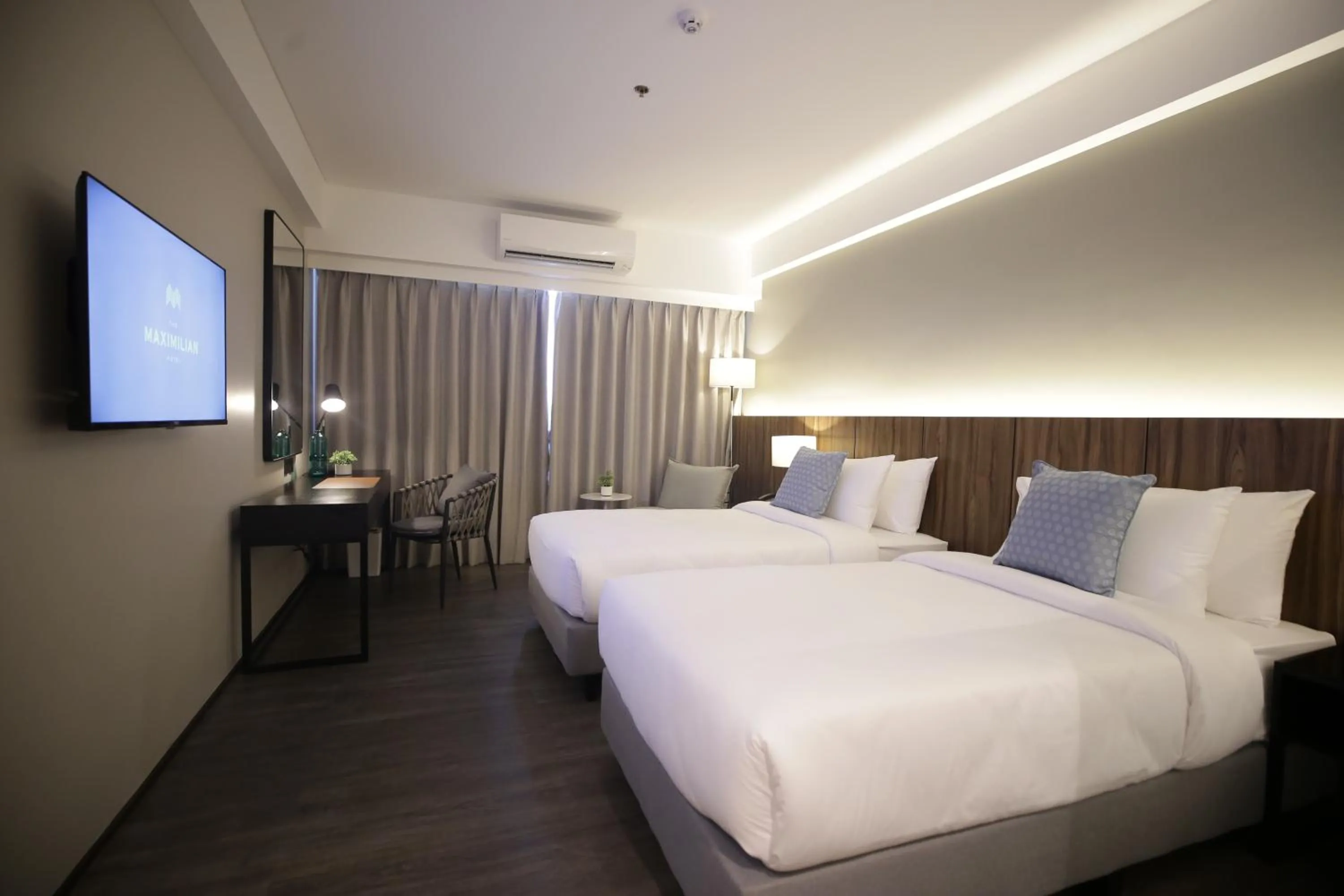 Bed in The Maximilian Hotel