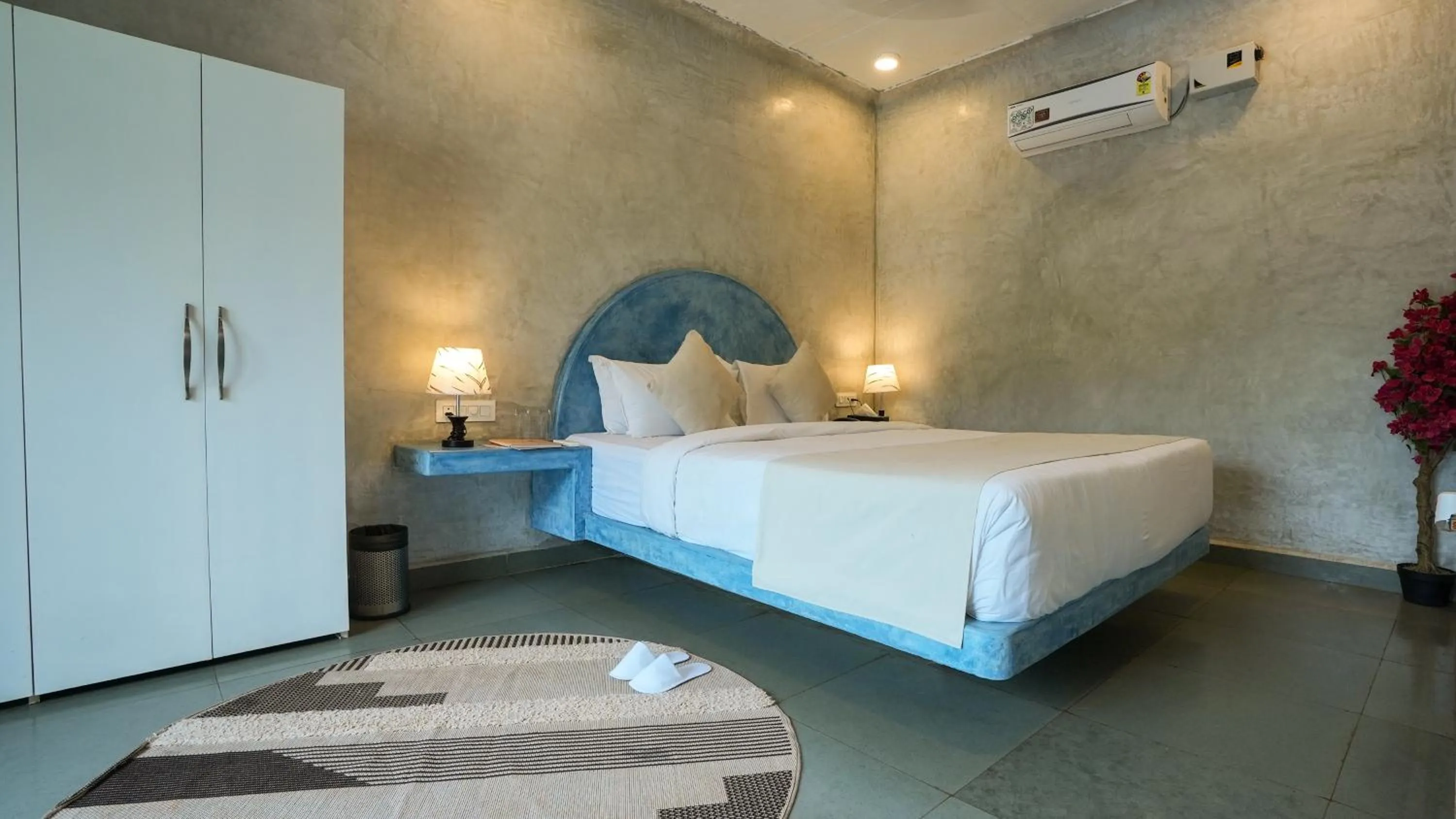 Bedroom in Whiteflower Resort Morjim