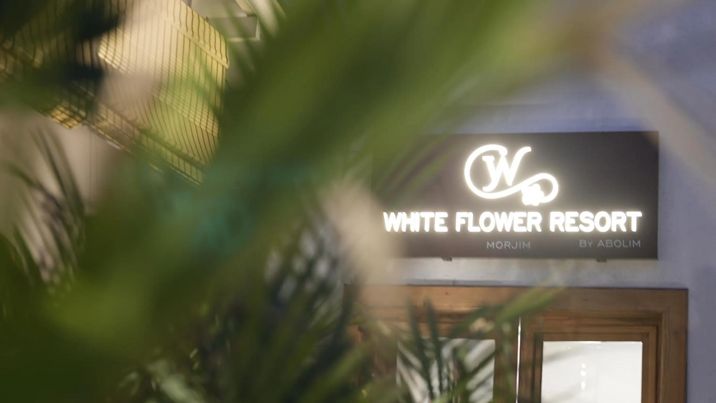 Property logo or sign in Whiteflower Resort Morjim