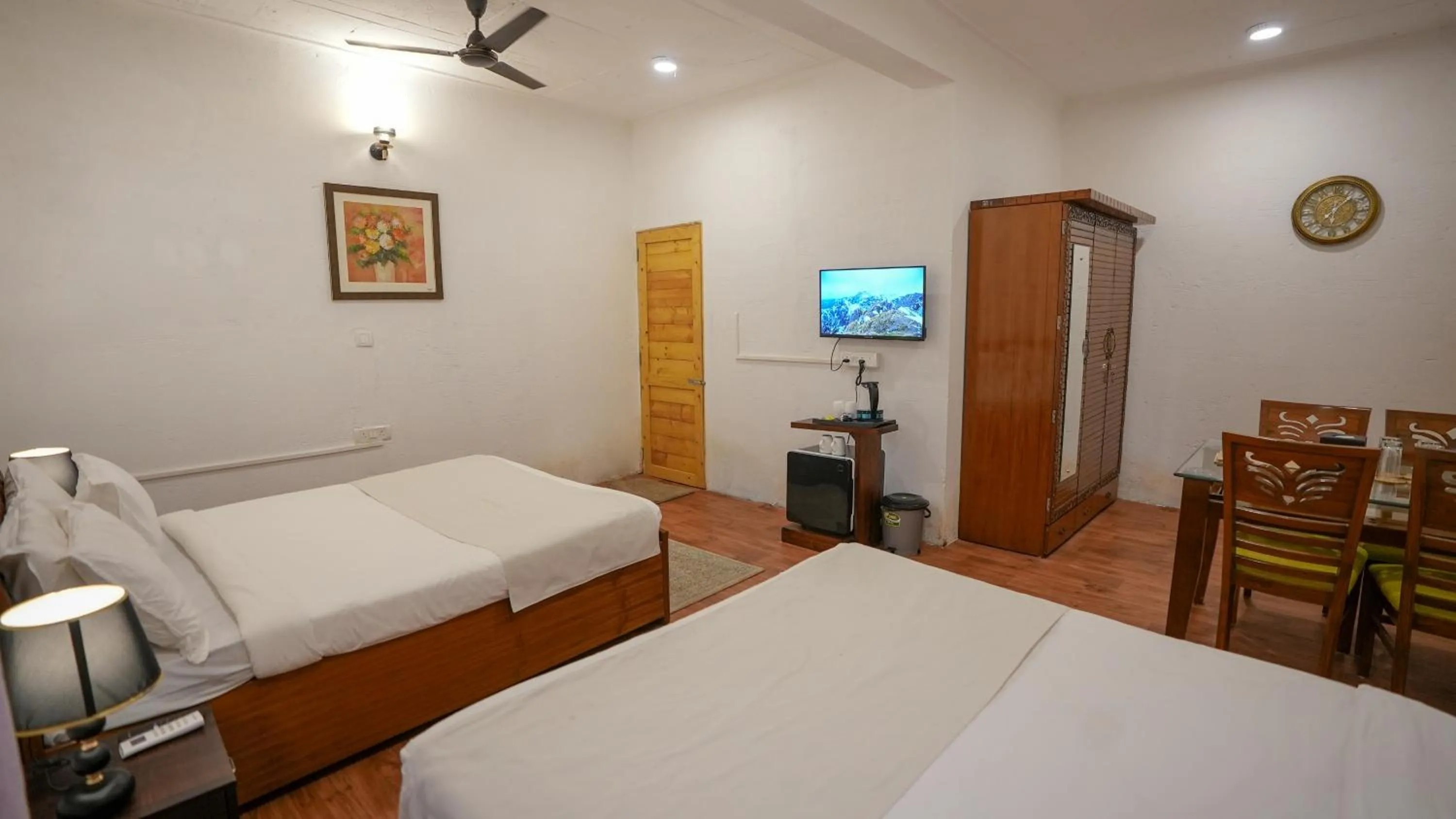 Bed in Whiteflower Resort Morjim