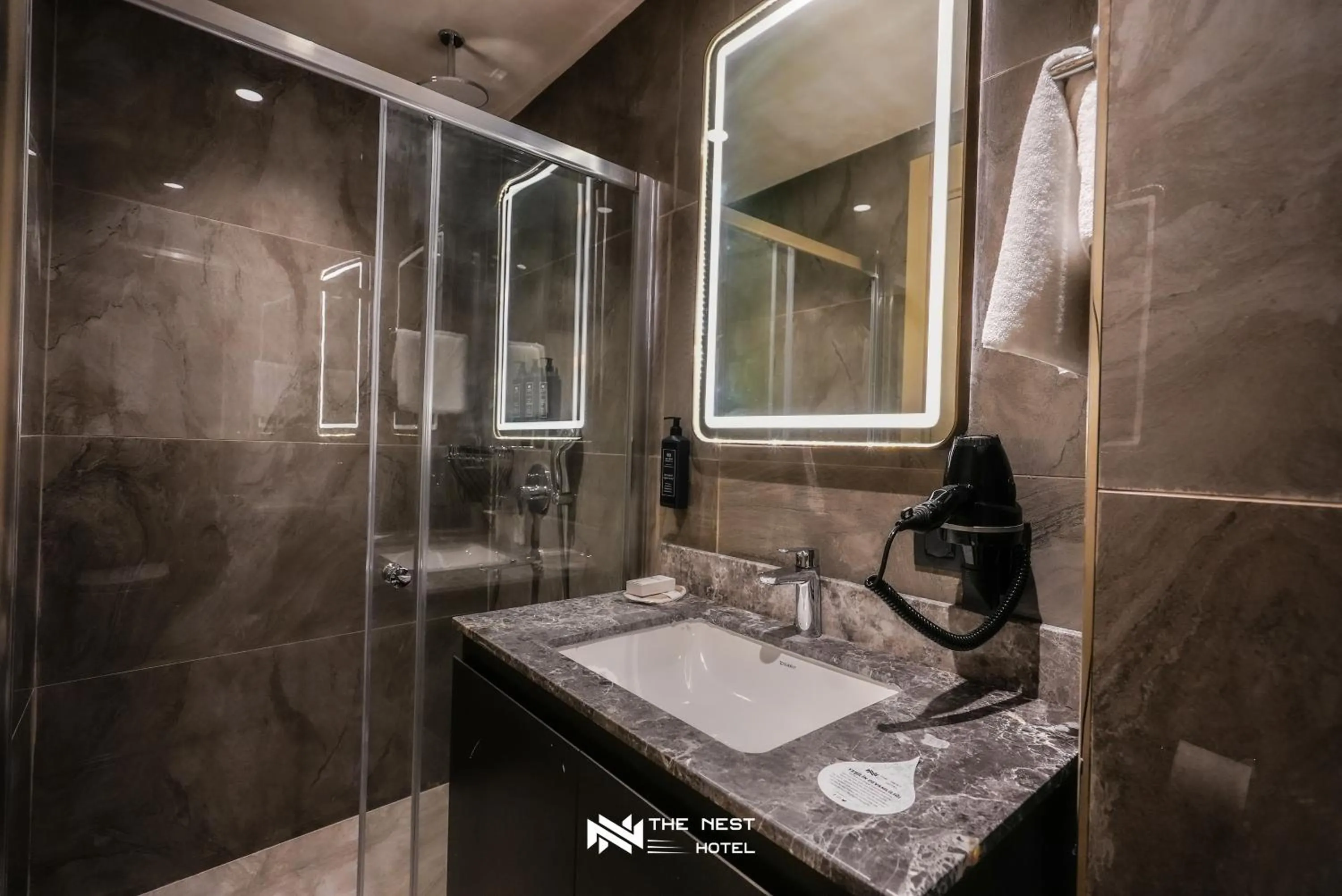 Shower in THE NEST HOTEL