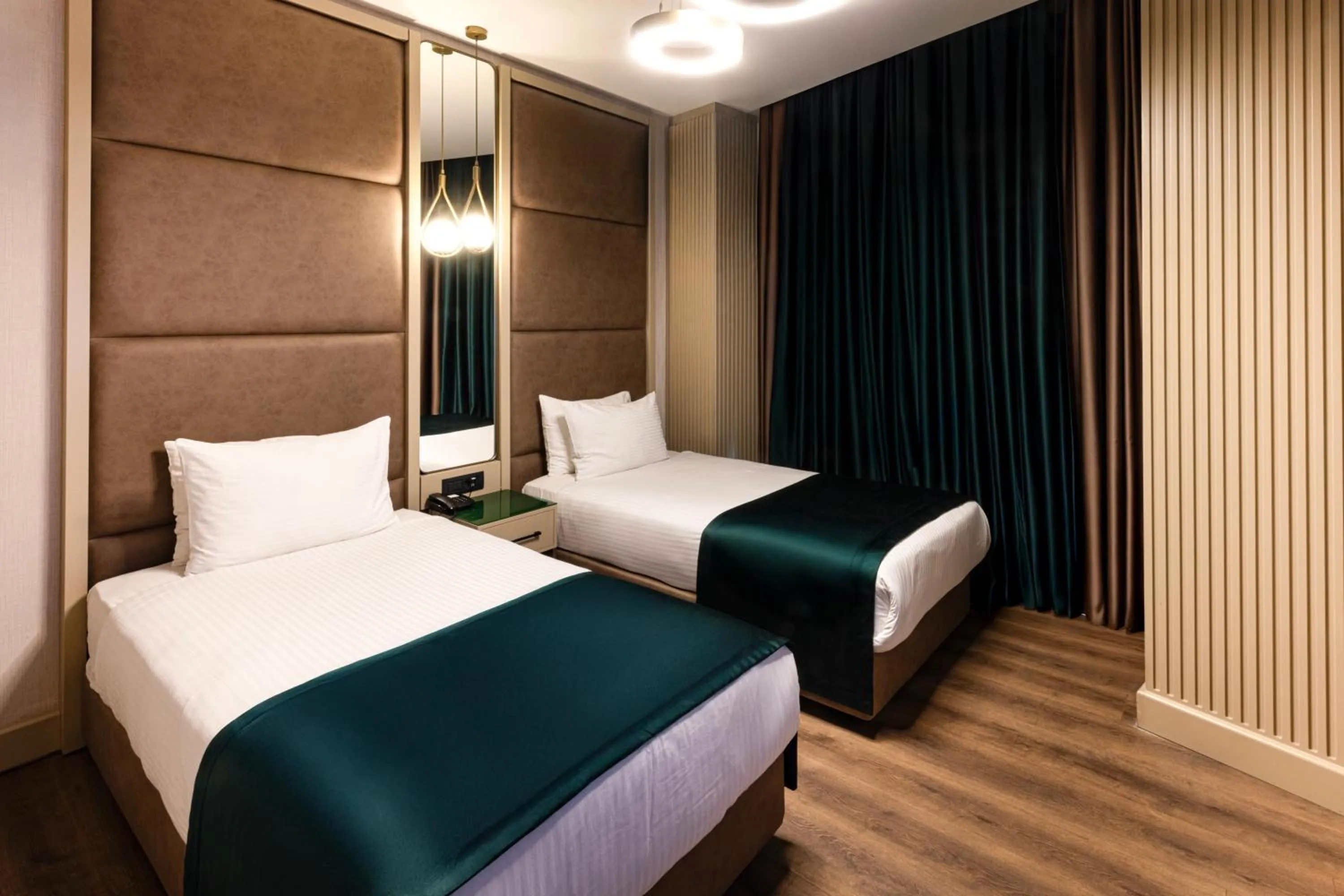 Bed in THE NEST HOTEL