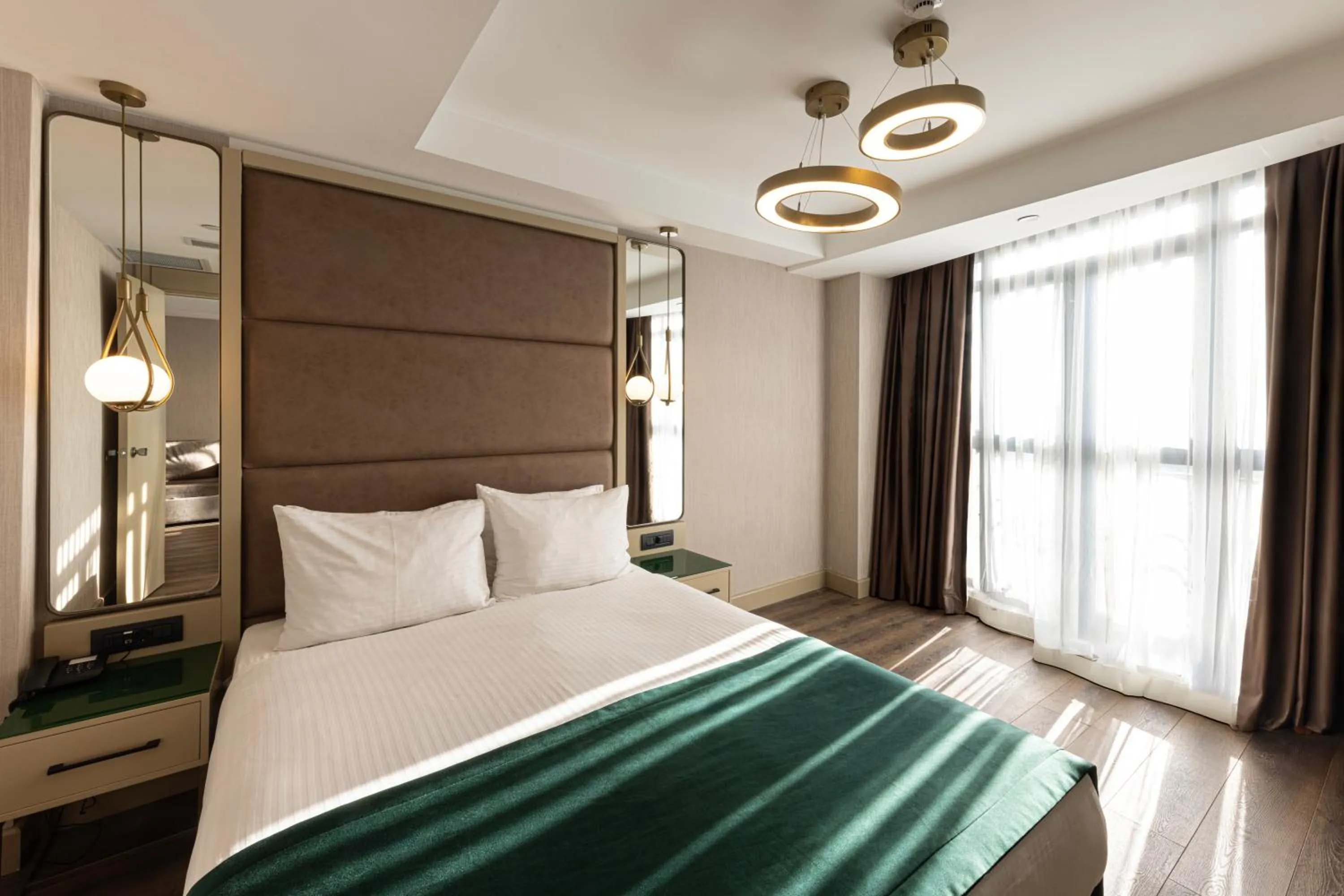 Bed in THE NEST HOTEL