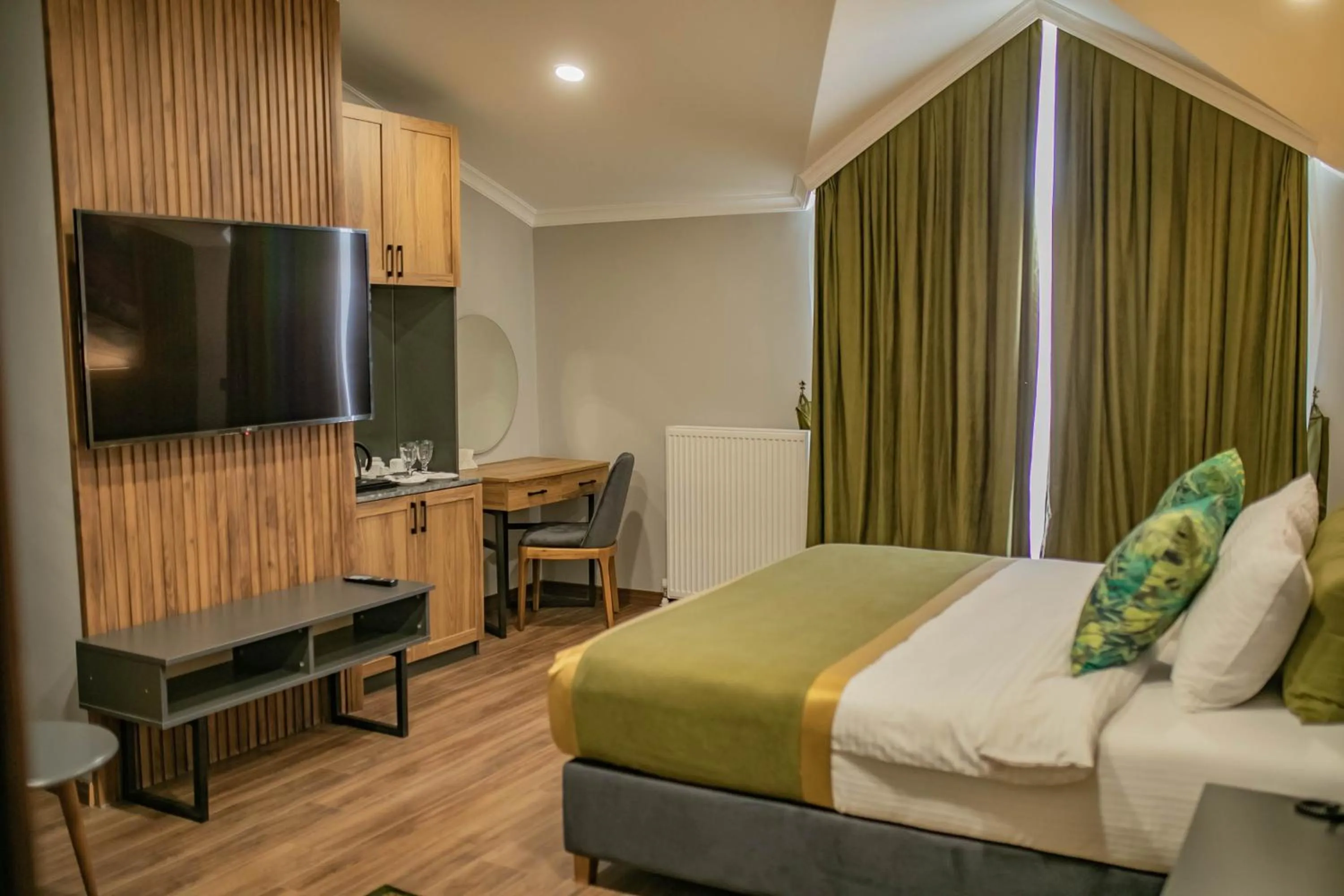 Bed in The Green Oasis Otel Spa