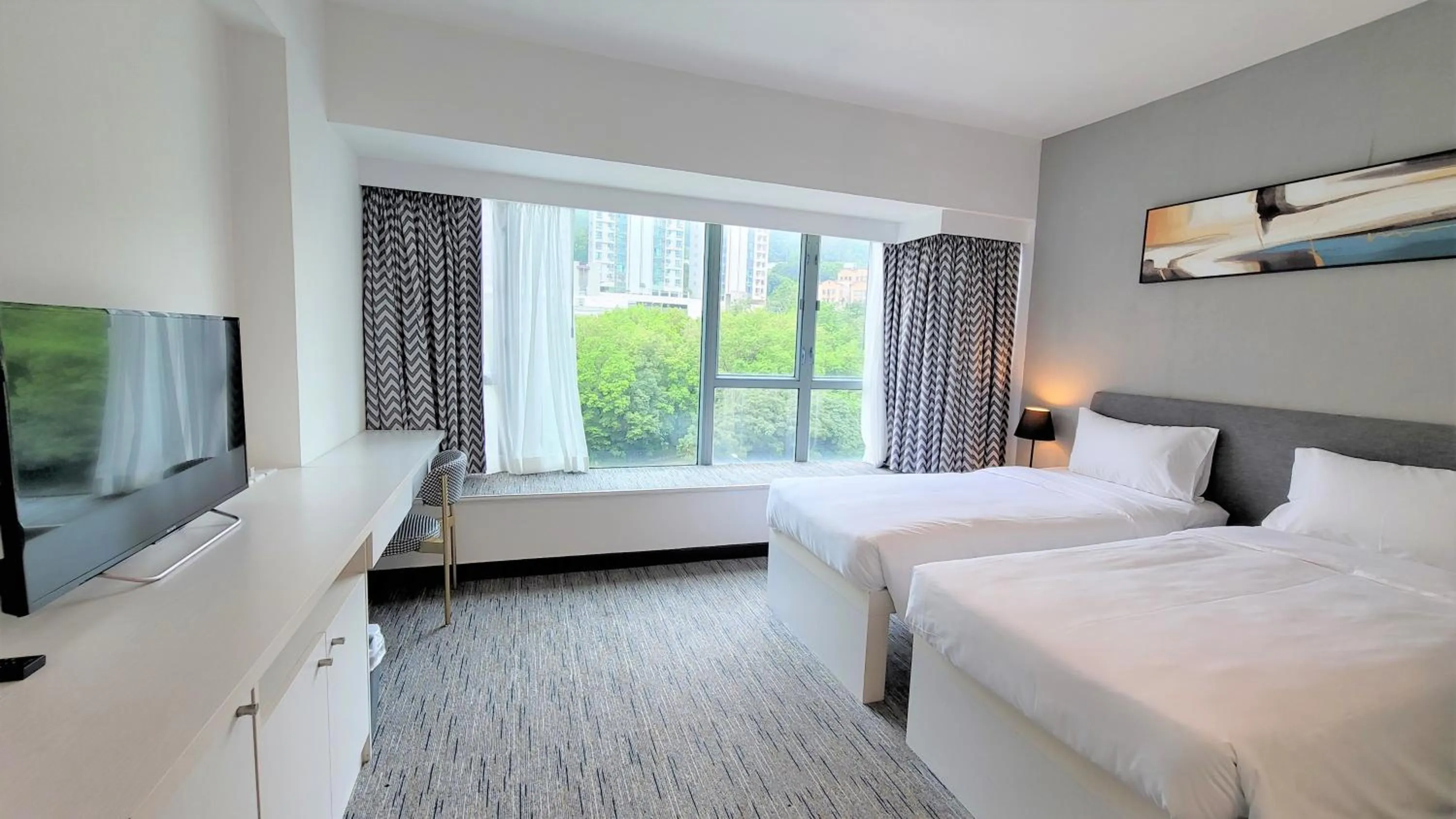 Bed in Grand Bay View Hotel