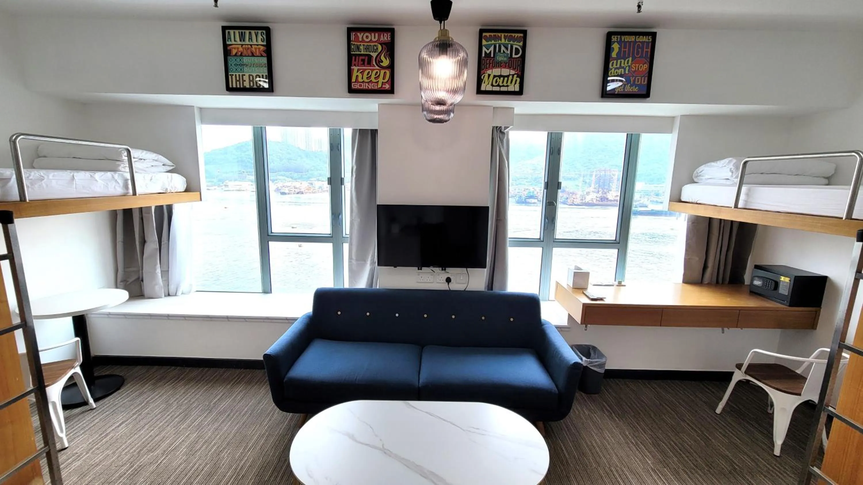 Living room, Bed in Grand Bay View Hotel