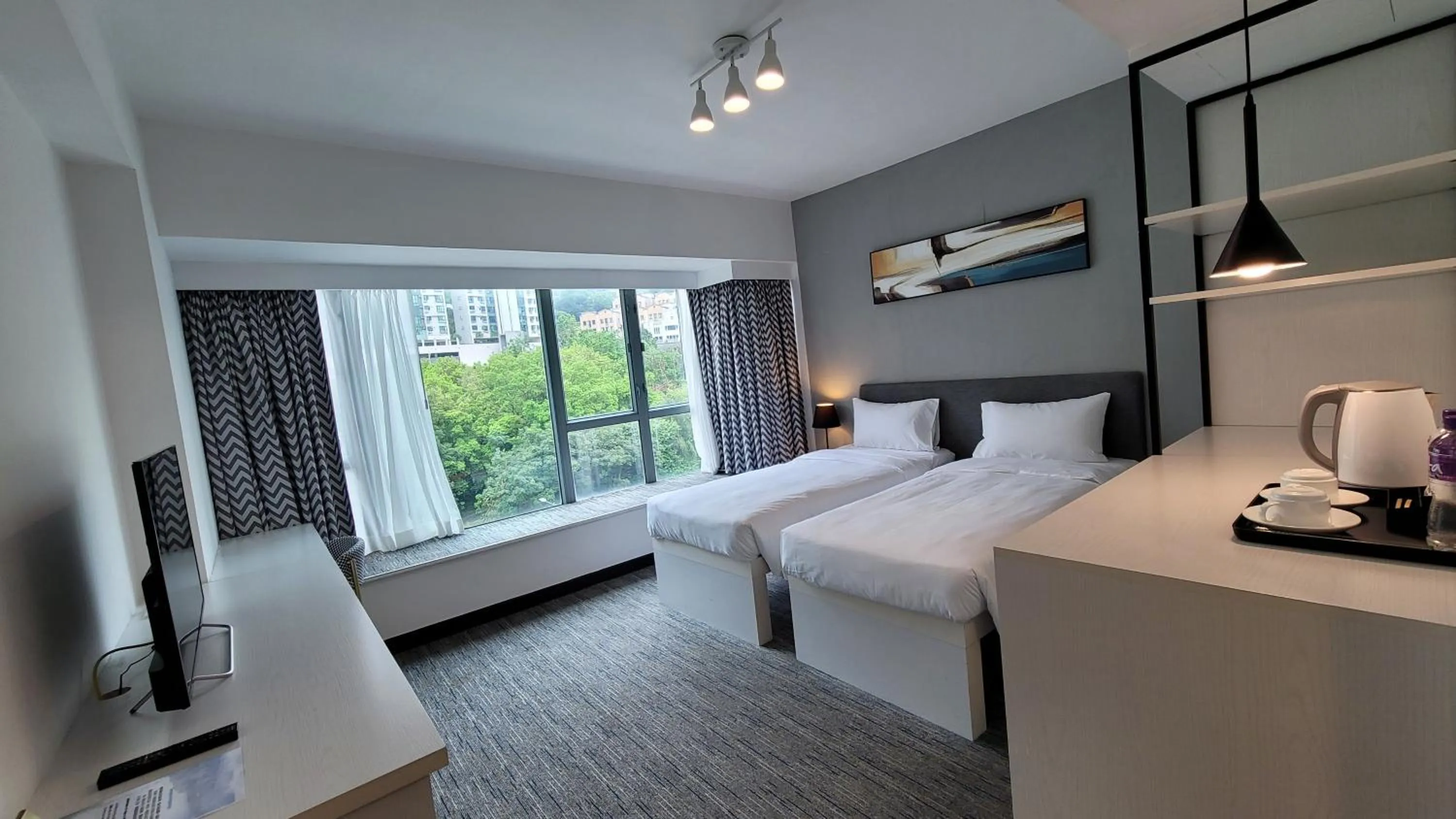 Bed in Grand Bay View Hotel