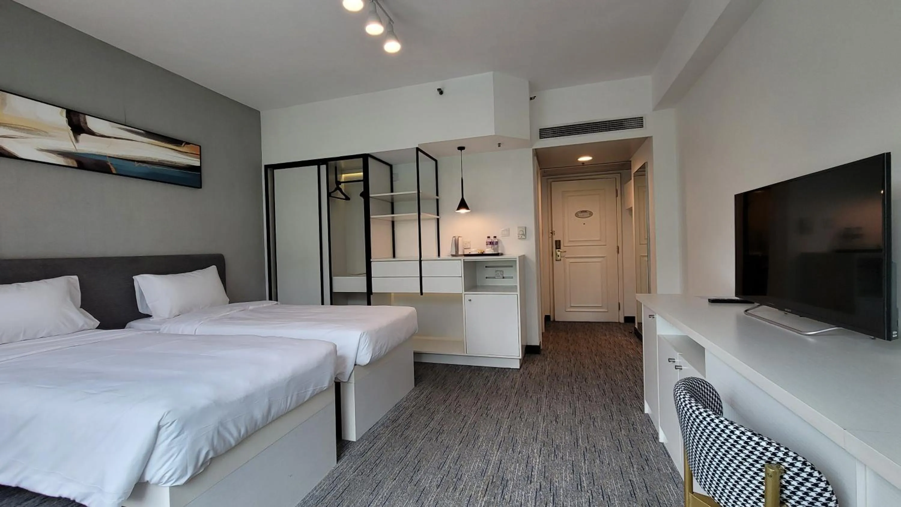 Bed in Grand Bay View Hotel