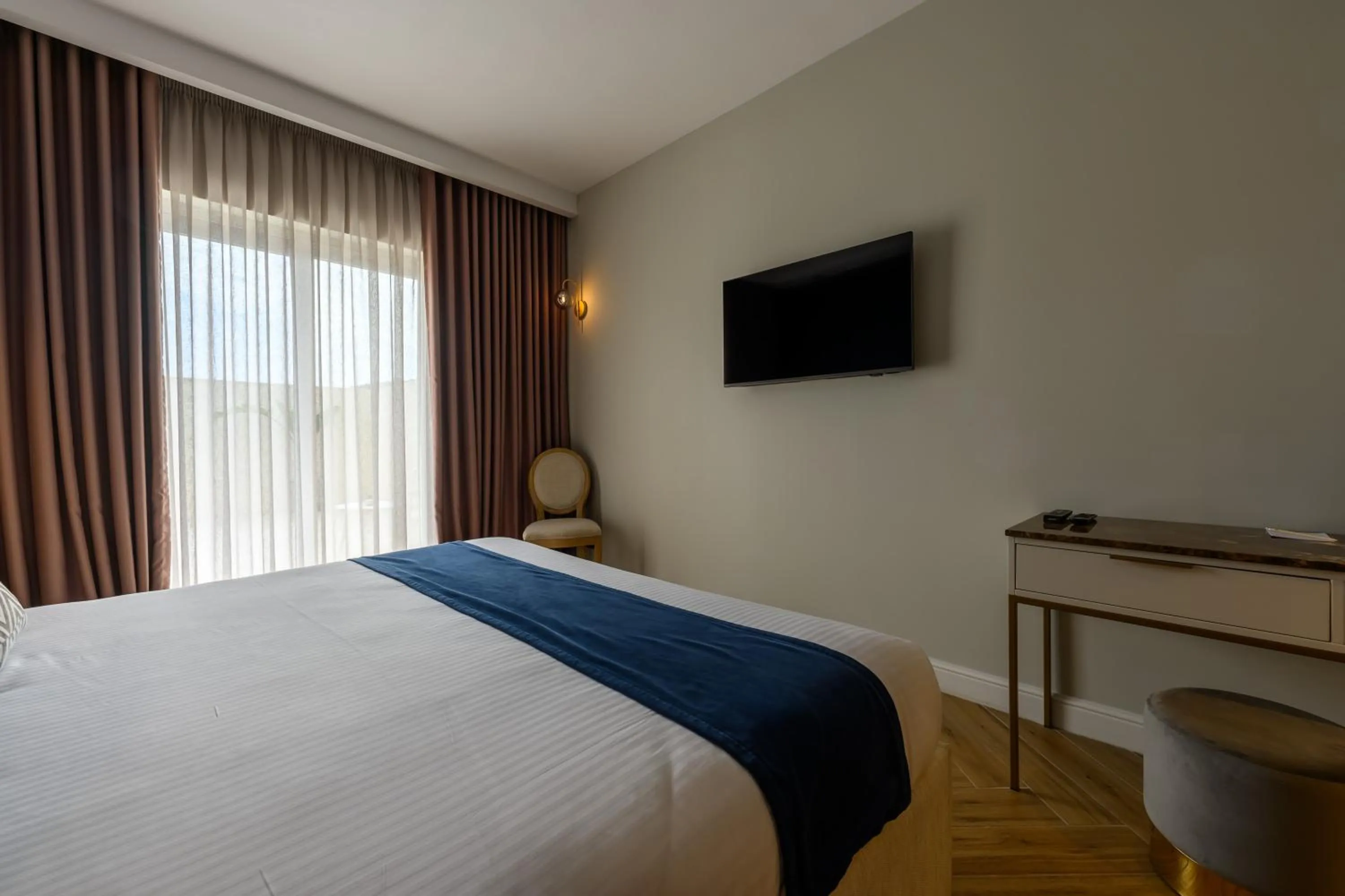 Bed in XVI Suites - Adults Only