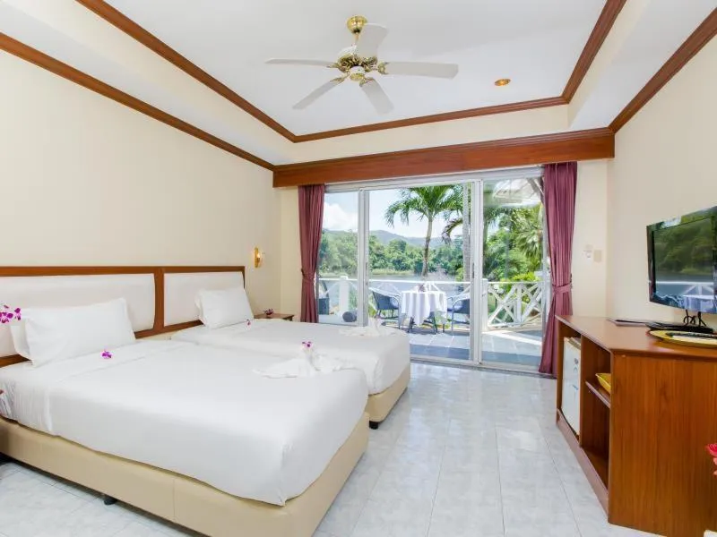 Bed in Serenity Lakeside Resort