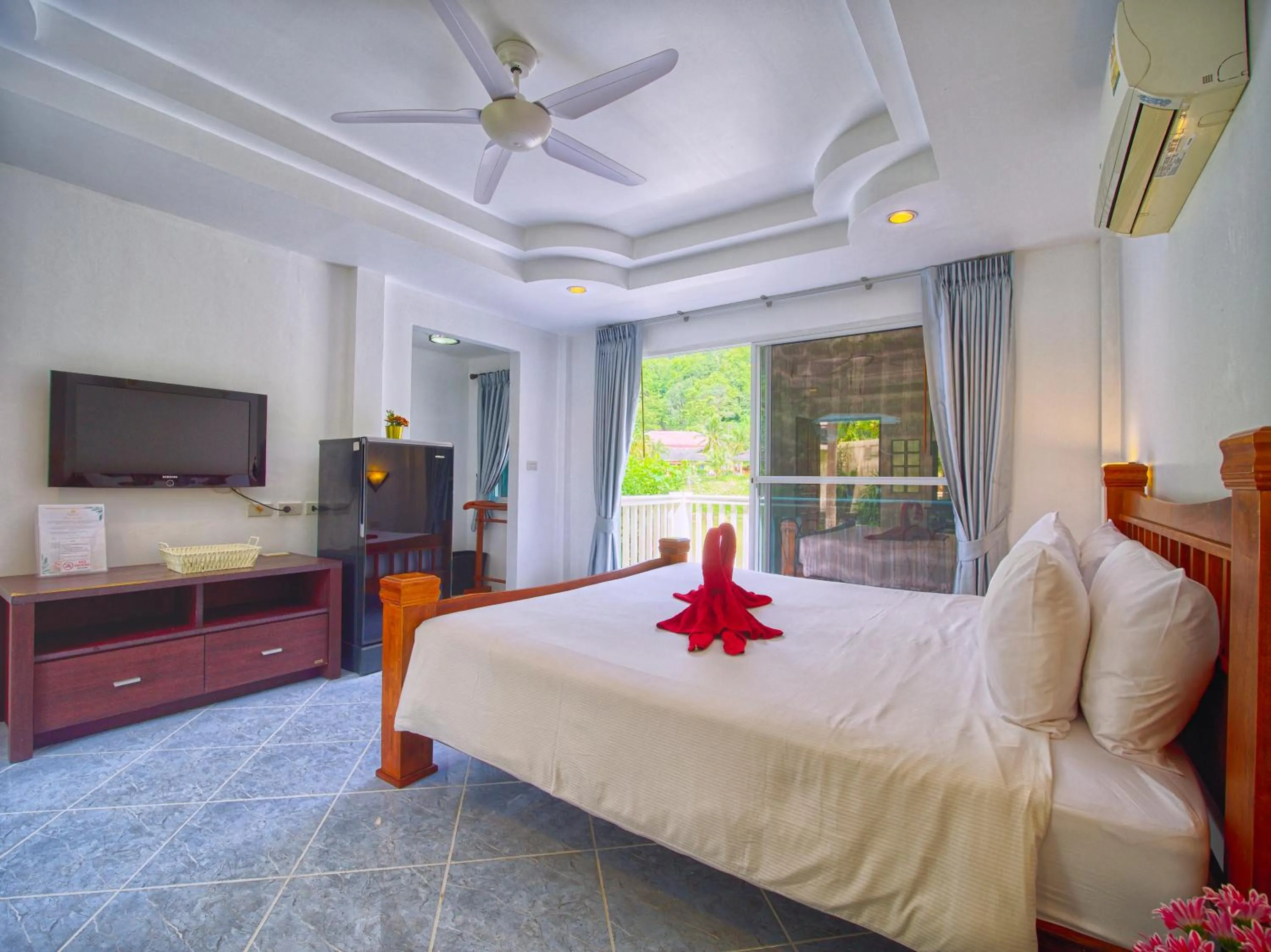 Bed in Serenity Lakeside Resort