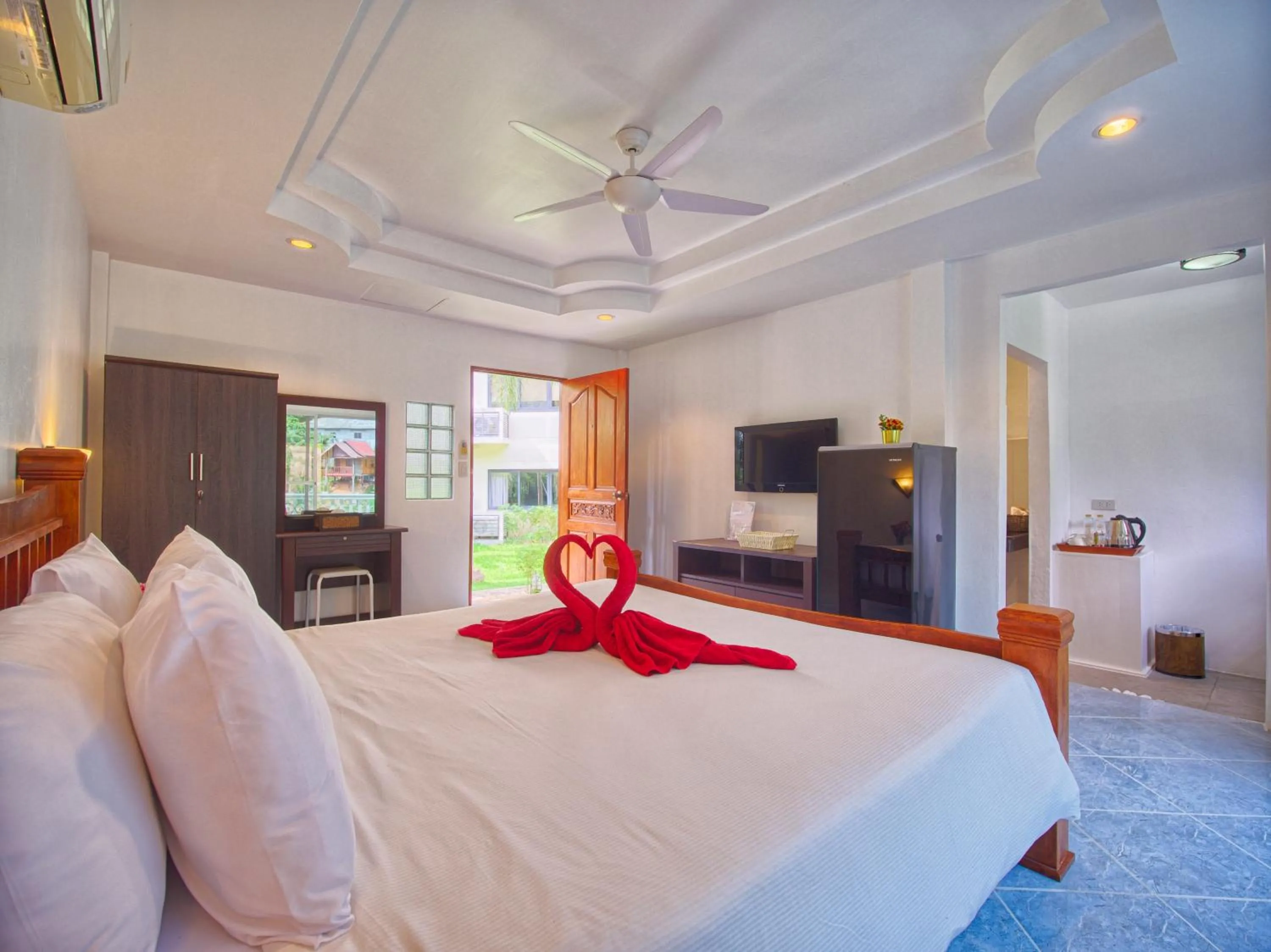 Bed in Serenity Lakeside Resort