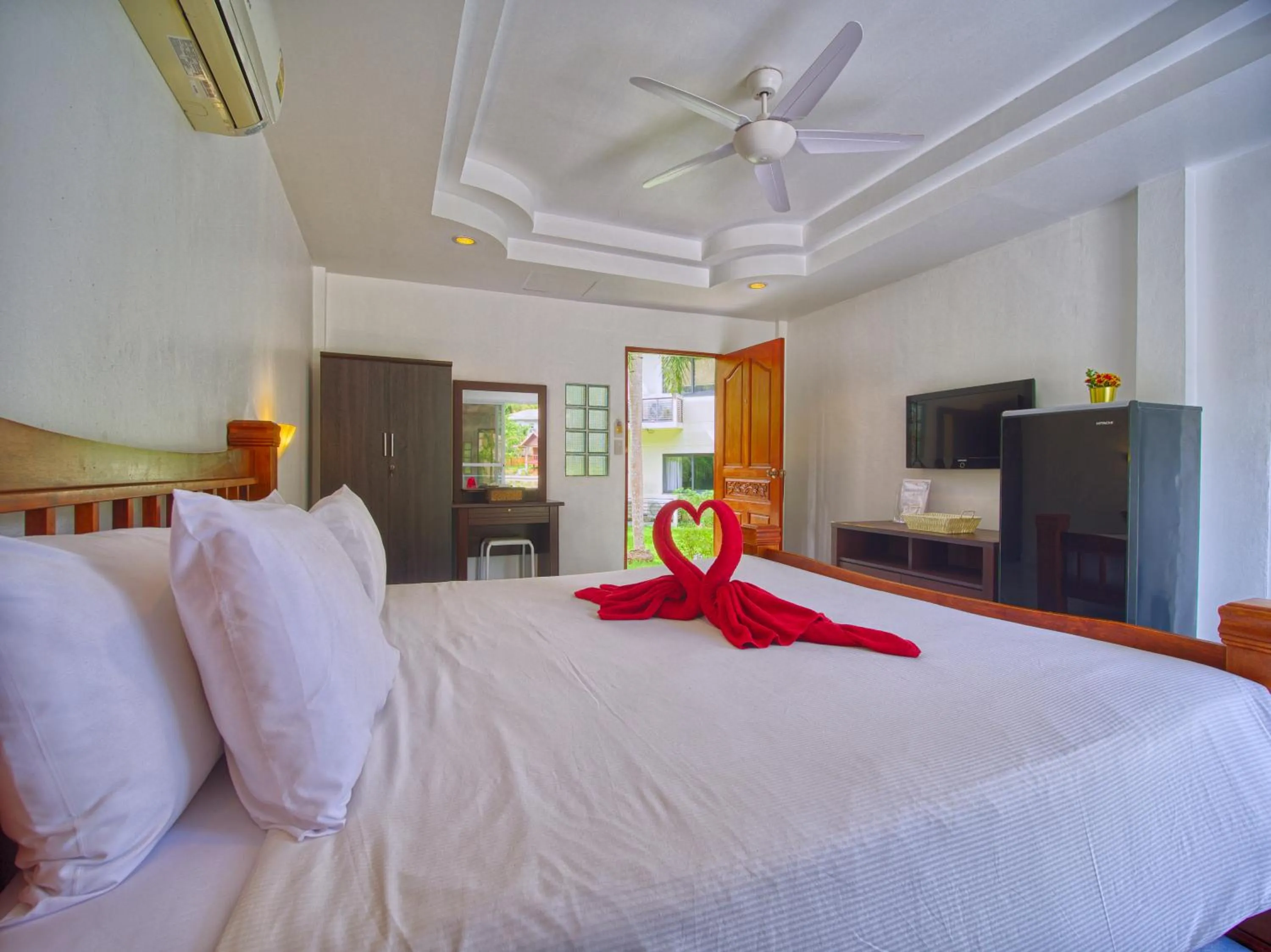 Bed in Serenity Lakeside Resort