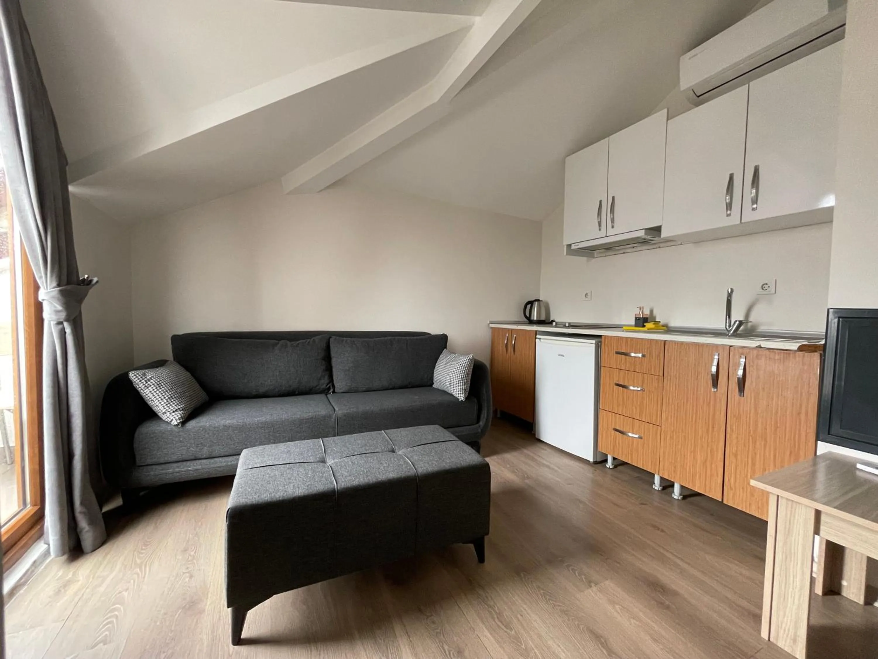 Seating area in Elegance Suites