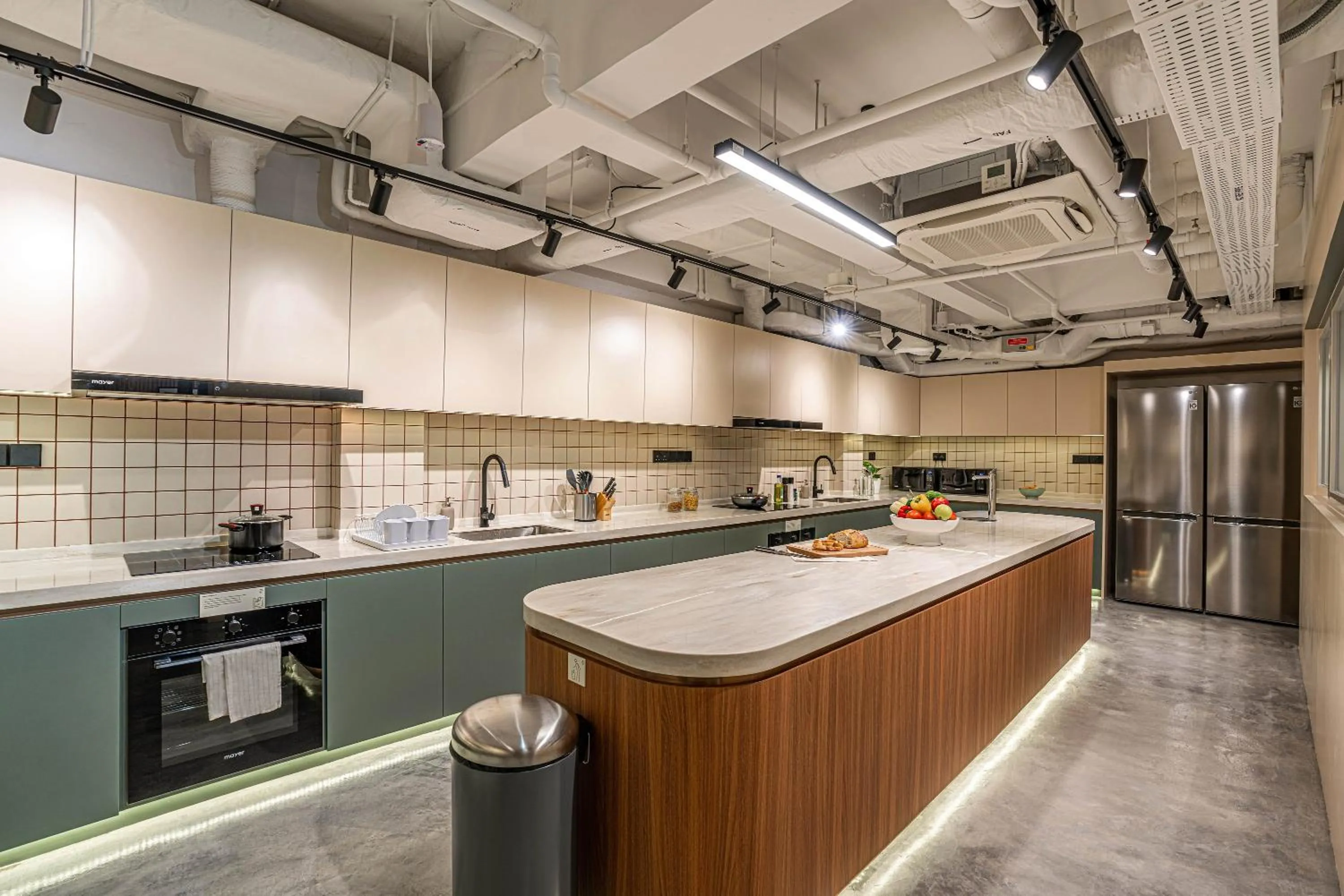 Communal kitchen in Weave Suites - Midtown