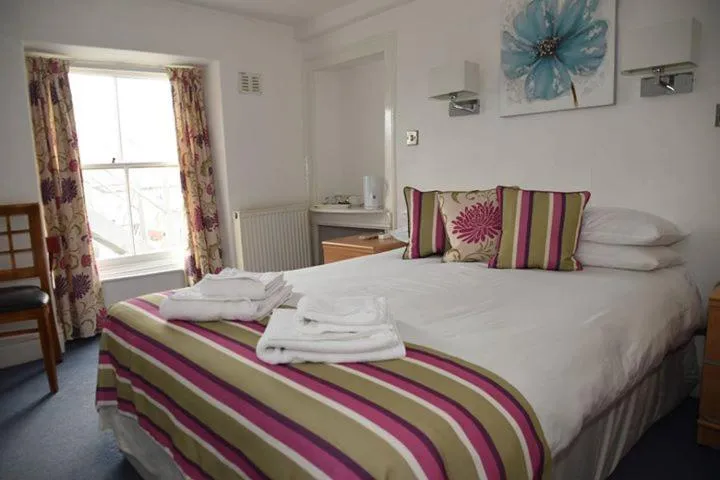 Photo of the whole room, Bed in Harry's Hotel & Restaurant