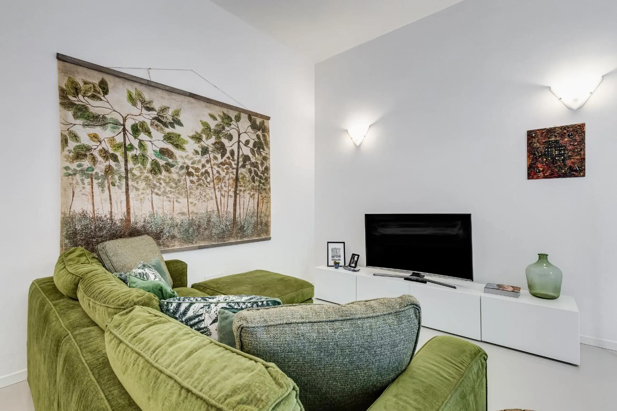 Communal lounge/ TV room in Colosseo Exclusive House by Premium Suites Collection