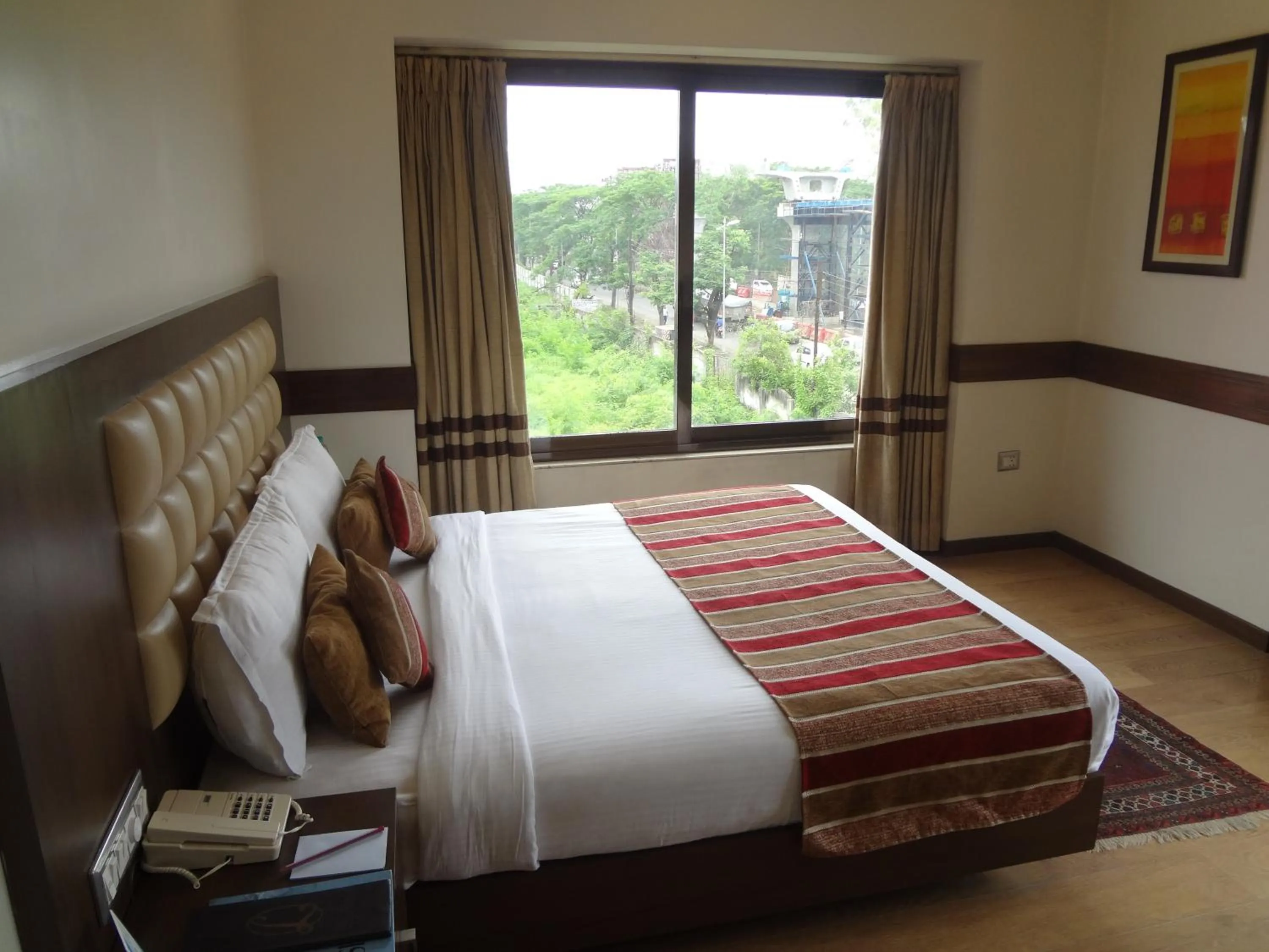 Bedroom, Bed in The Legend Inn @Nagpur