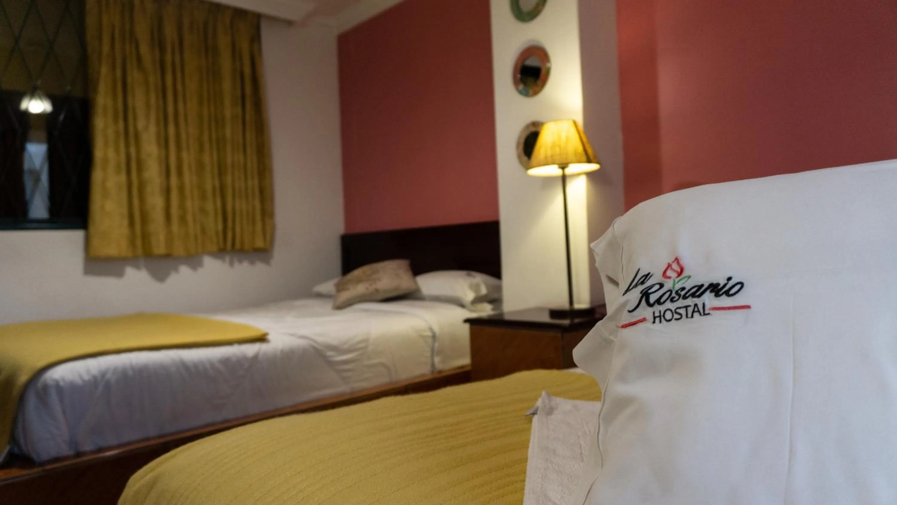 Bed in La Rosario Hotel