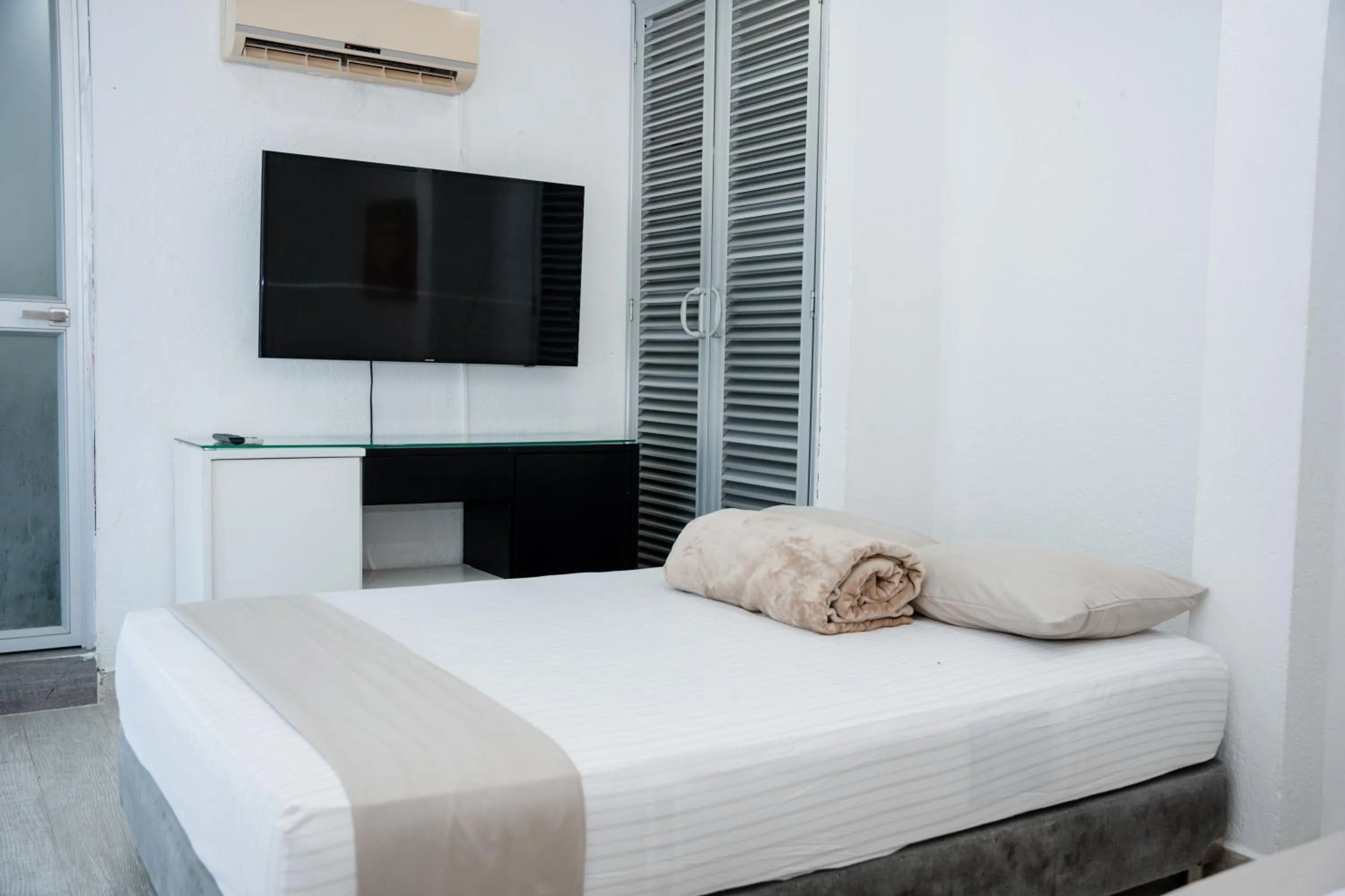 Bed in Hotel Kaamú Taganga