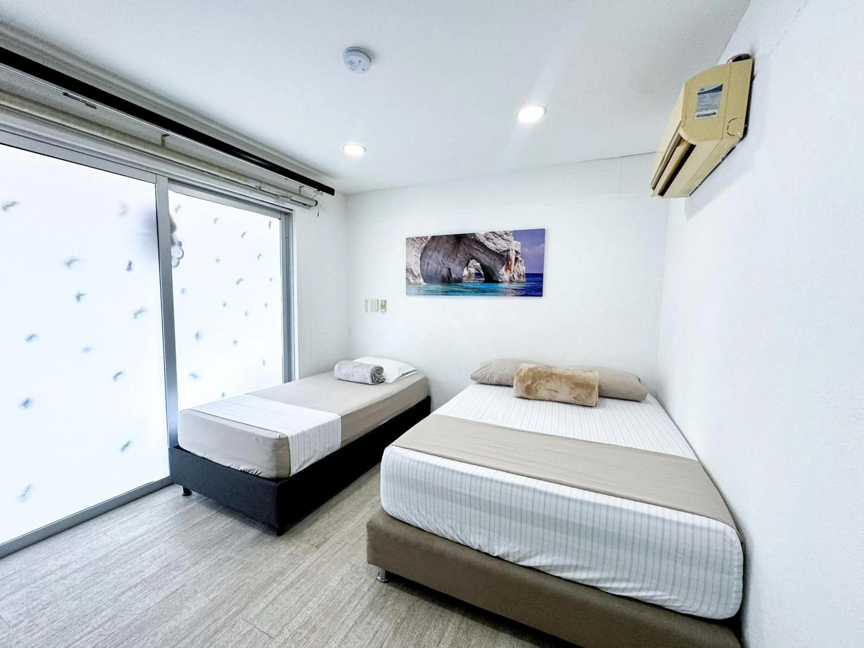 Bed in Hotel Kaamú Taganga