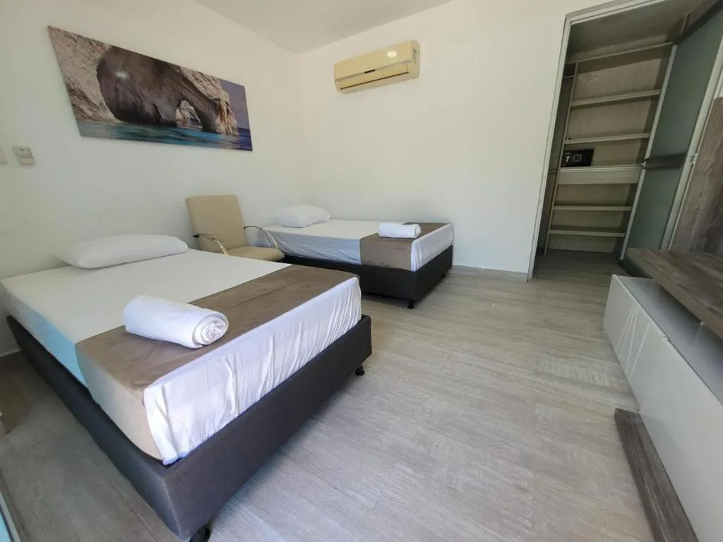 Bed in Hotel Kaamú Taganga