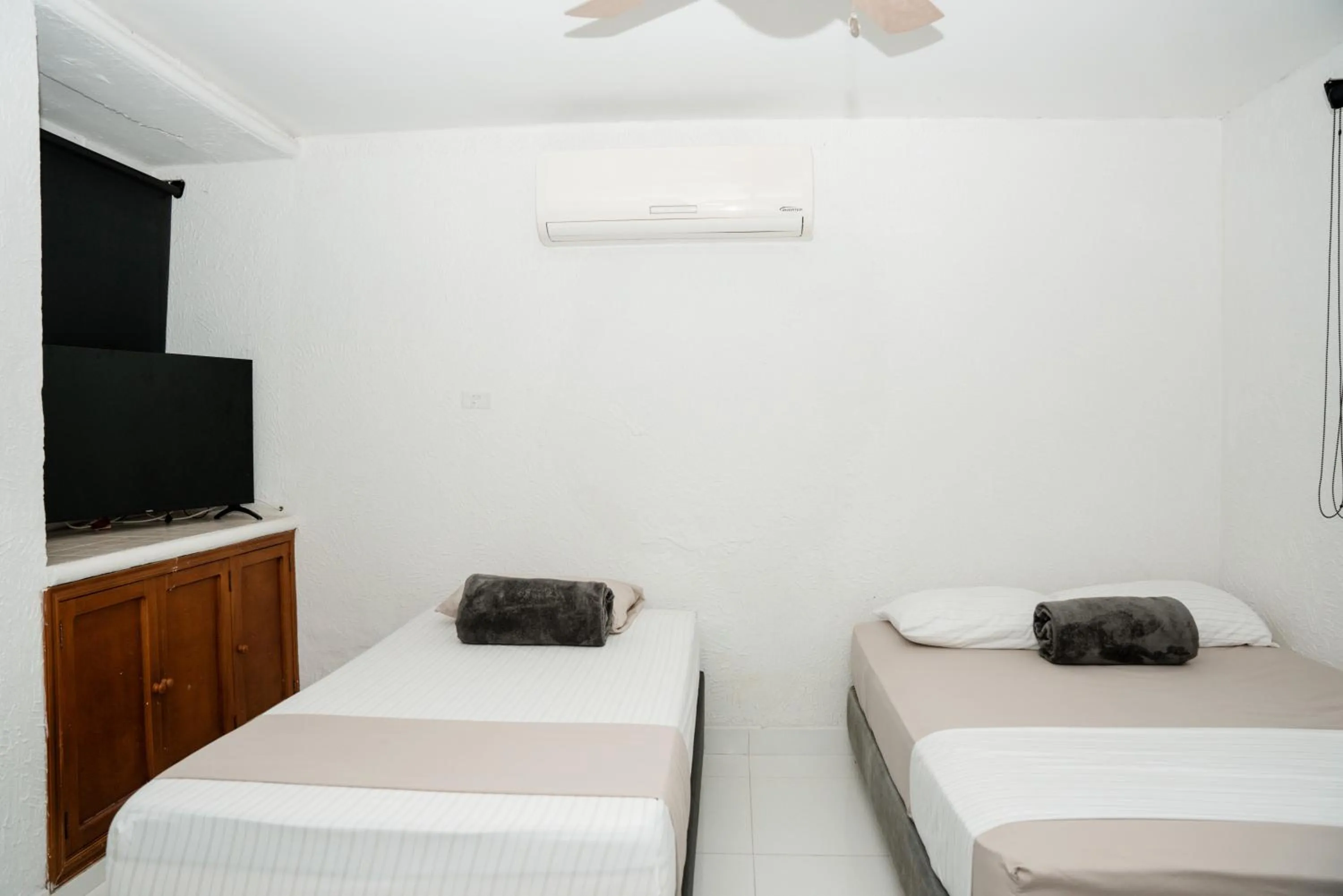 Bed in Hotel Kaamú Taganga