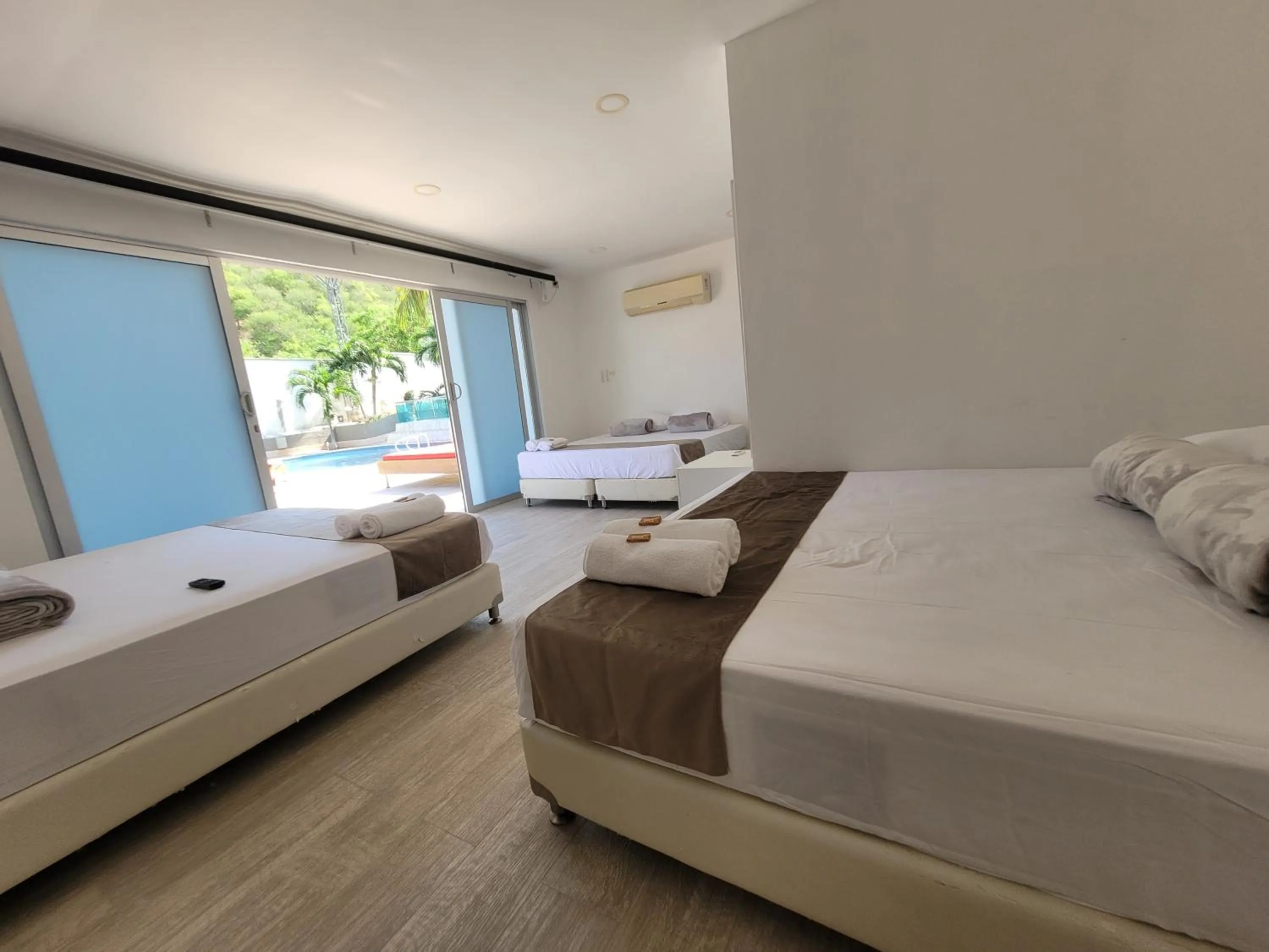Photo of the whole room, Bed in Hotel Kaamú Taganga