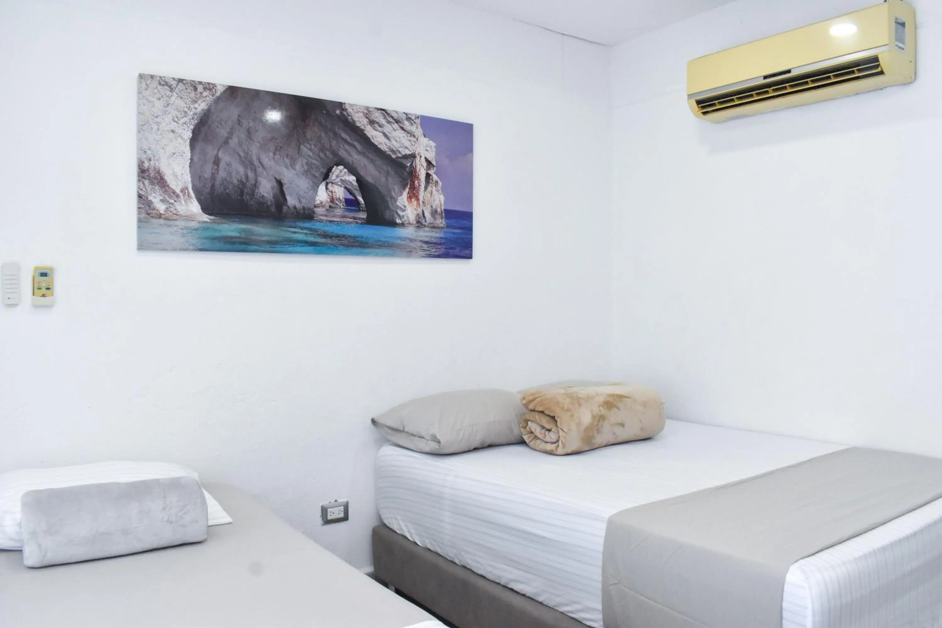 Bed in Hotel Kaamú Taganga