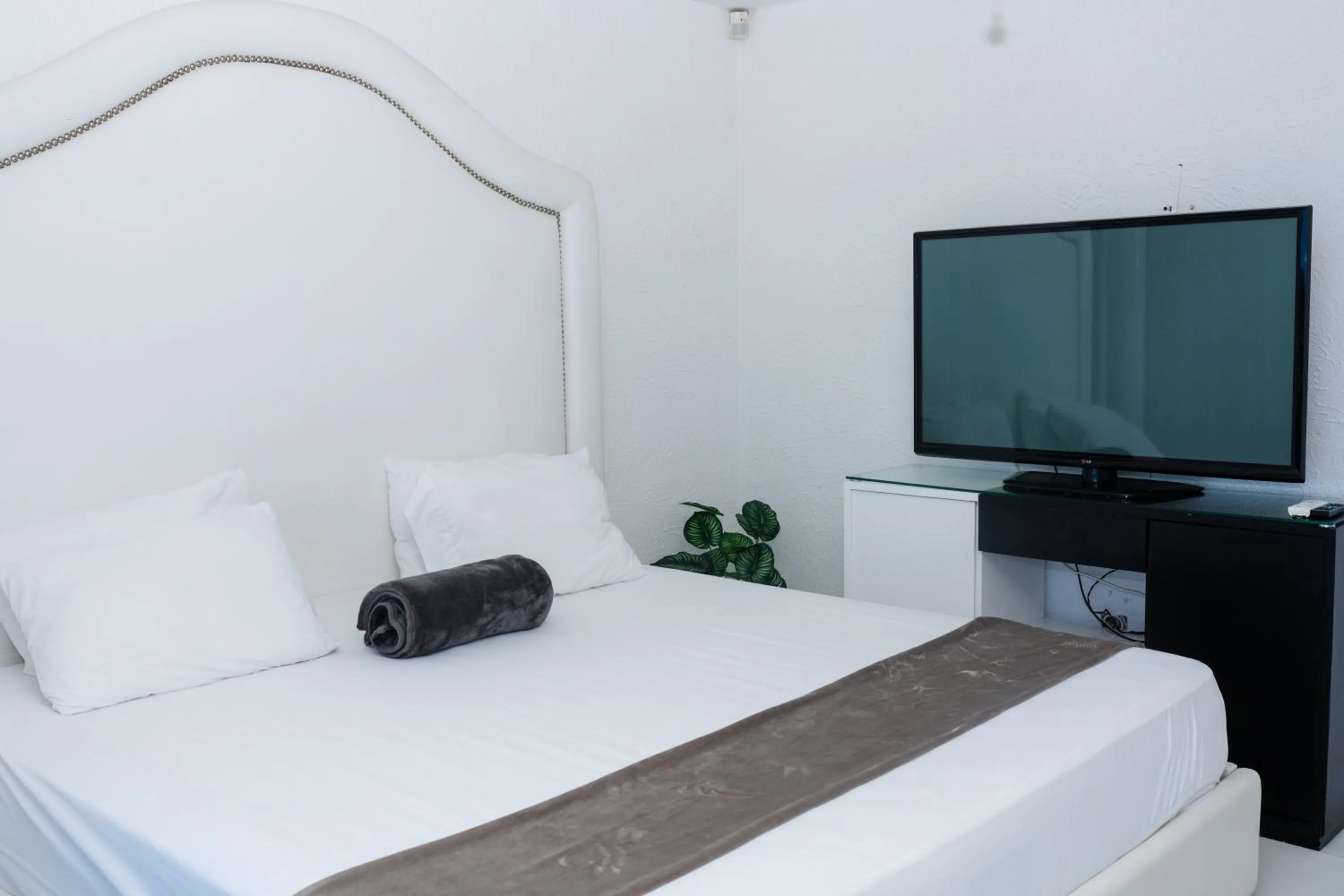 Bed in Hotel Kaamú Taganga