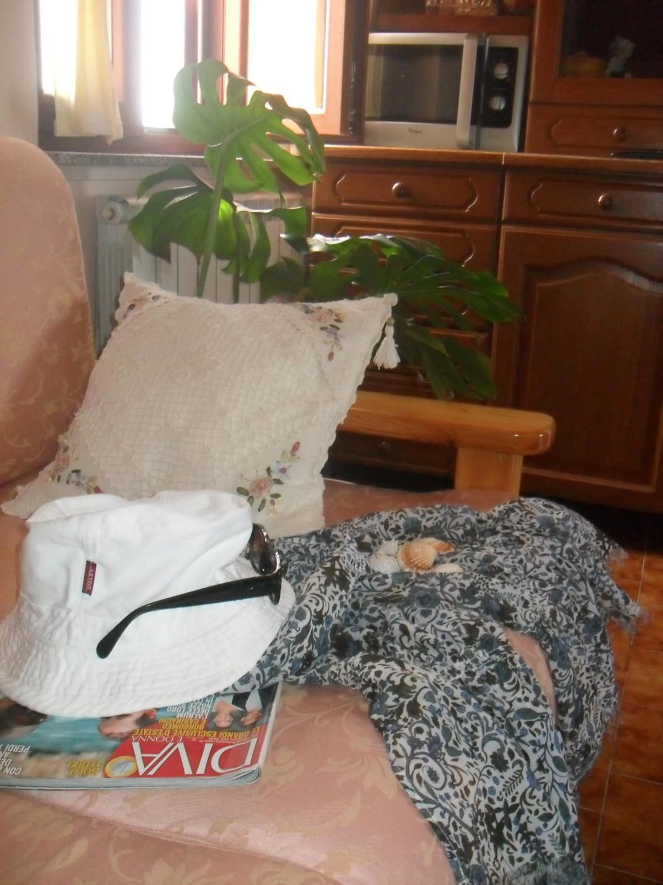 Communal lounge/ TV room in B&B Villa Claudia