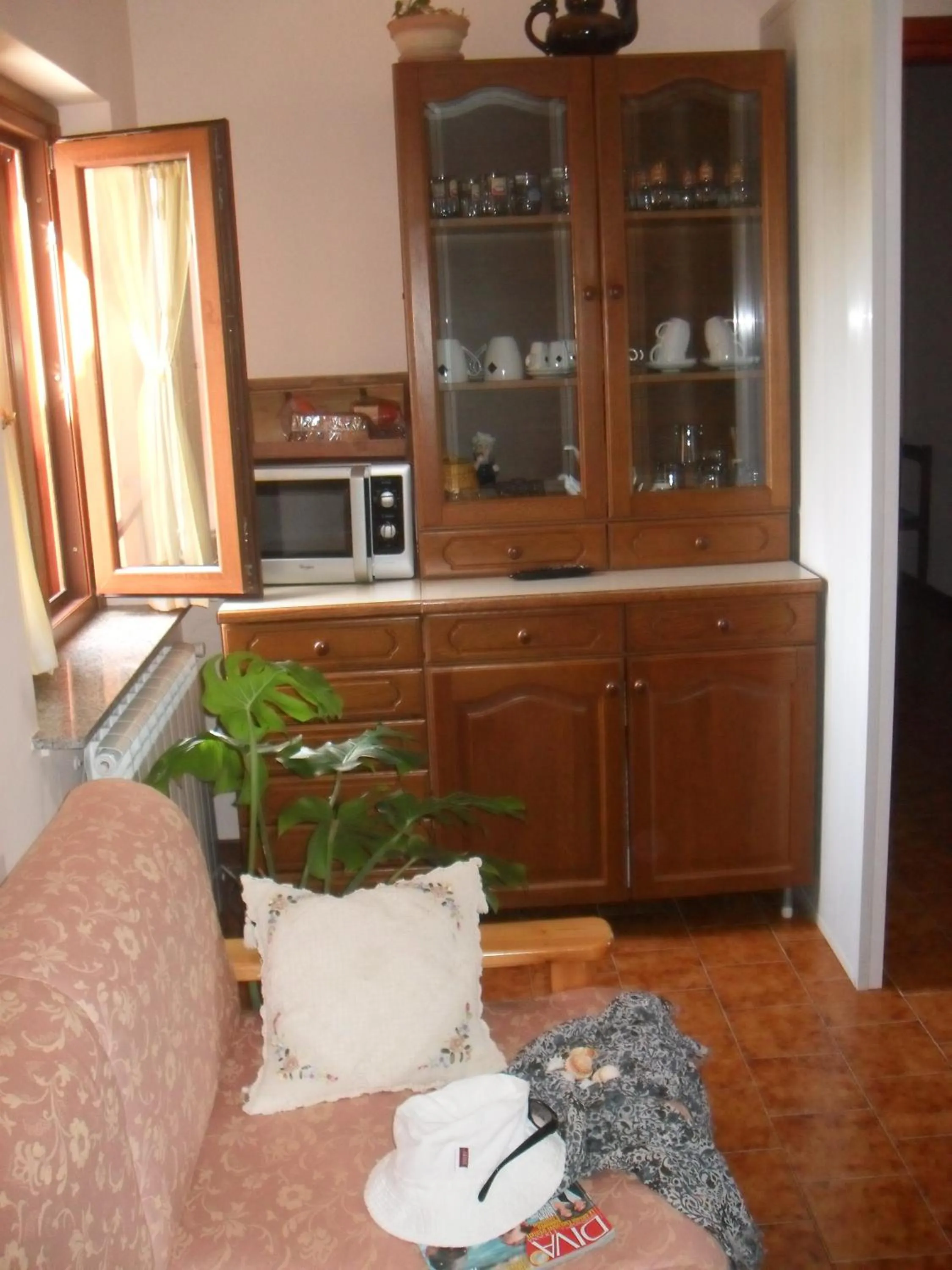 Communal lounge/ TV room in B&B Villa Claudia