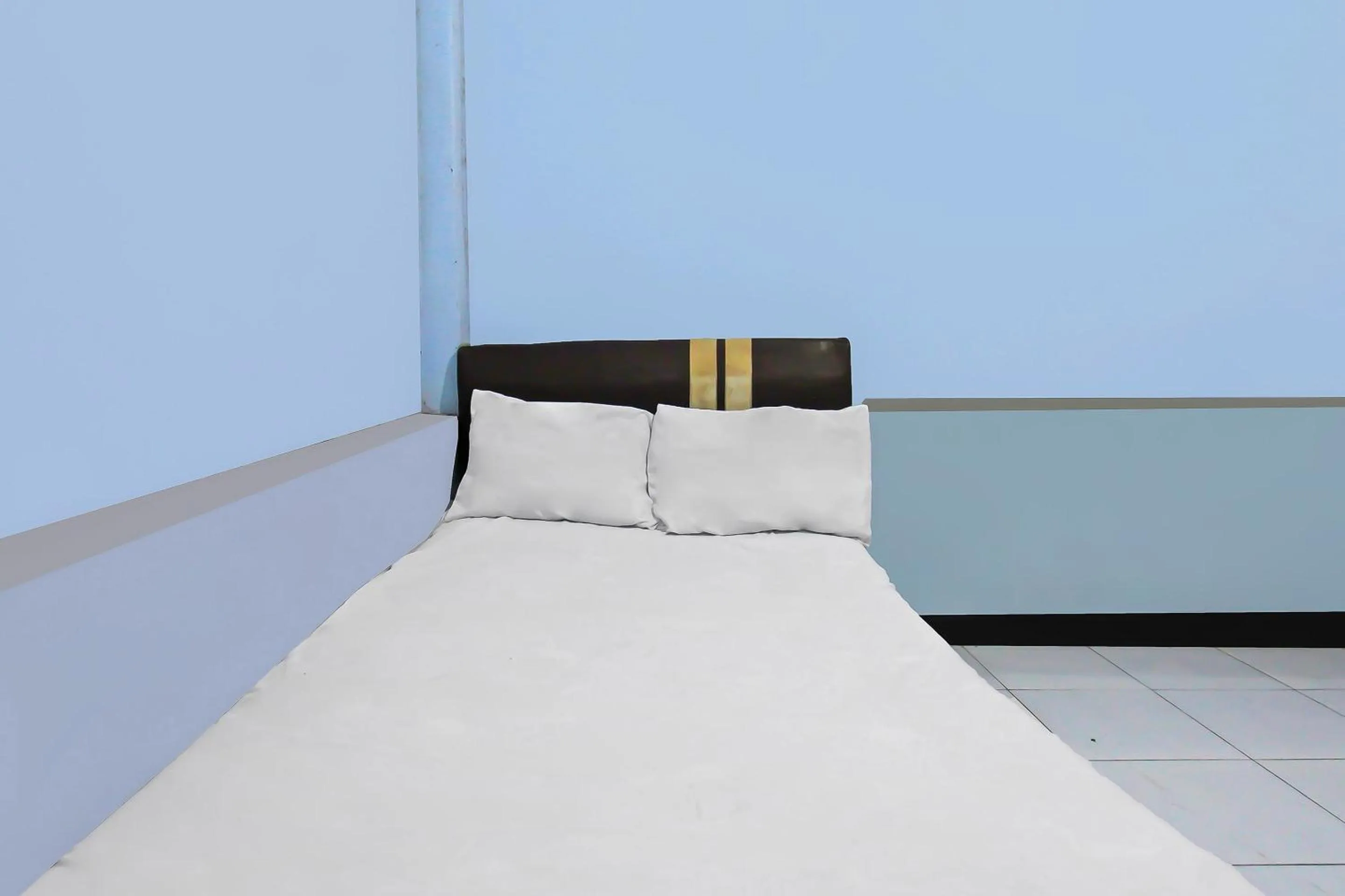 Bedroom, Bed in Hotel O Jati Homestay Near Taman Suranadi