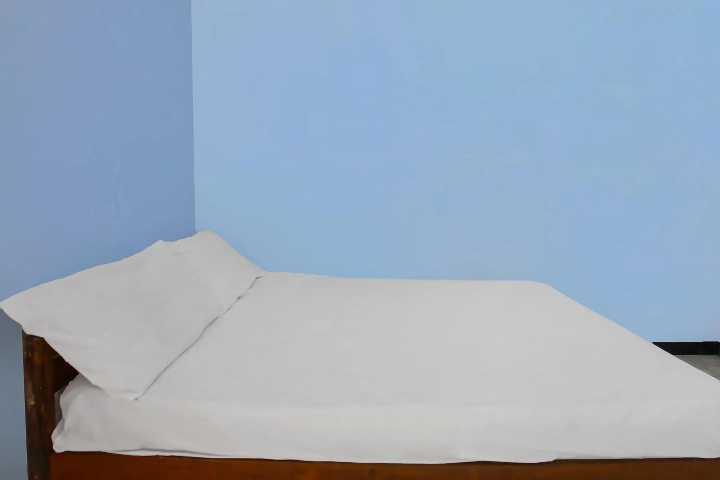 Bedroom, Bed in Hotel O Jati Homestay Near Taman Suranadi