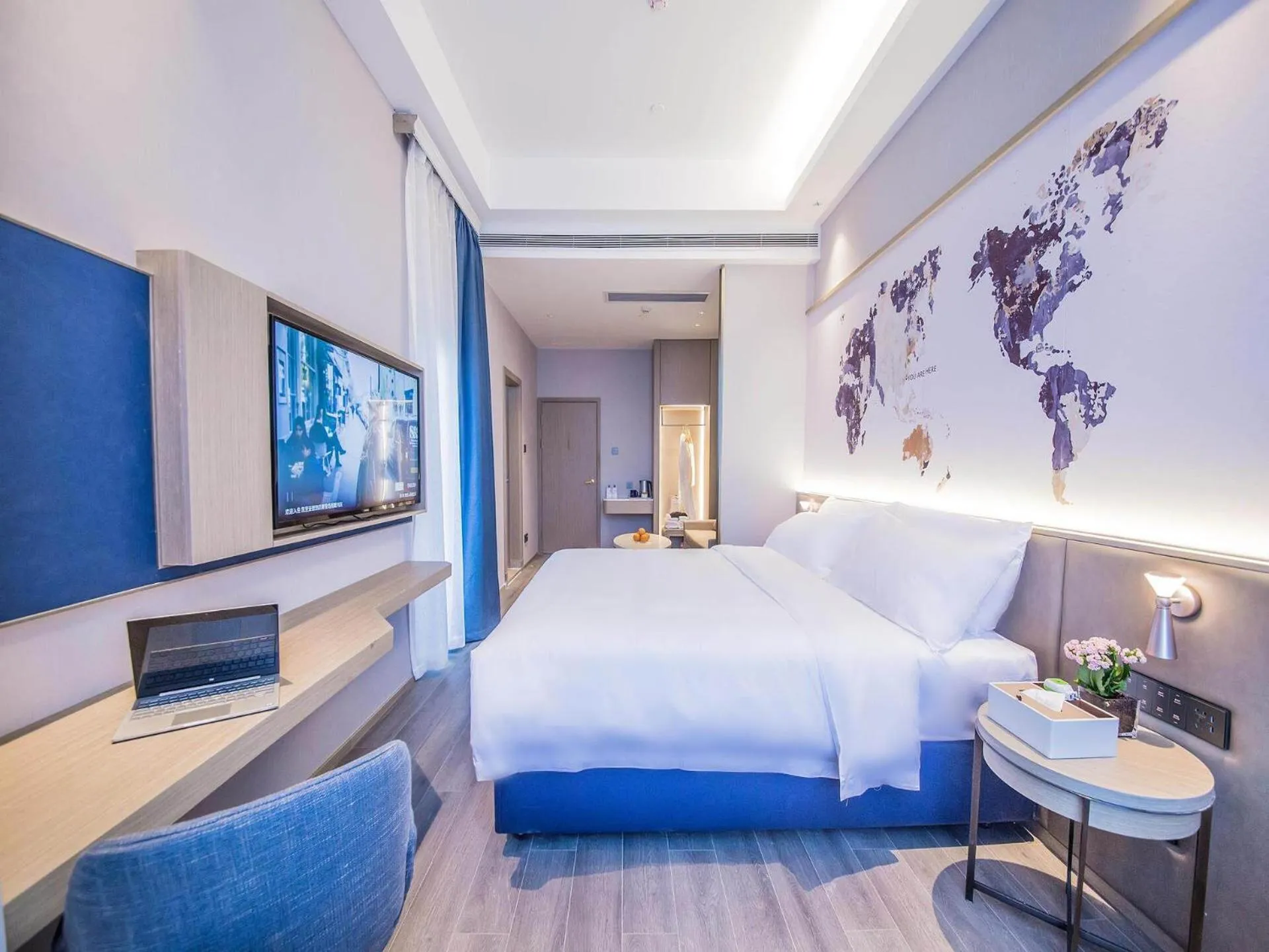 Bed in Kyriad Marvelous Hotel Qinhuangdao Nandaihe