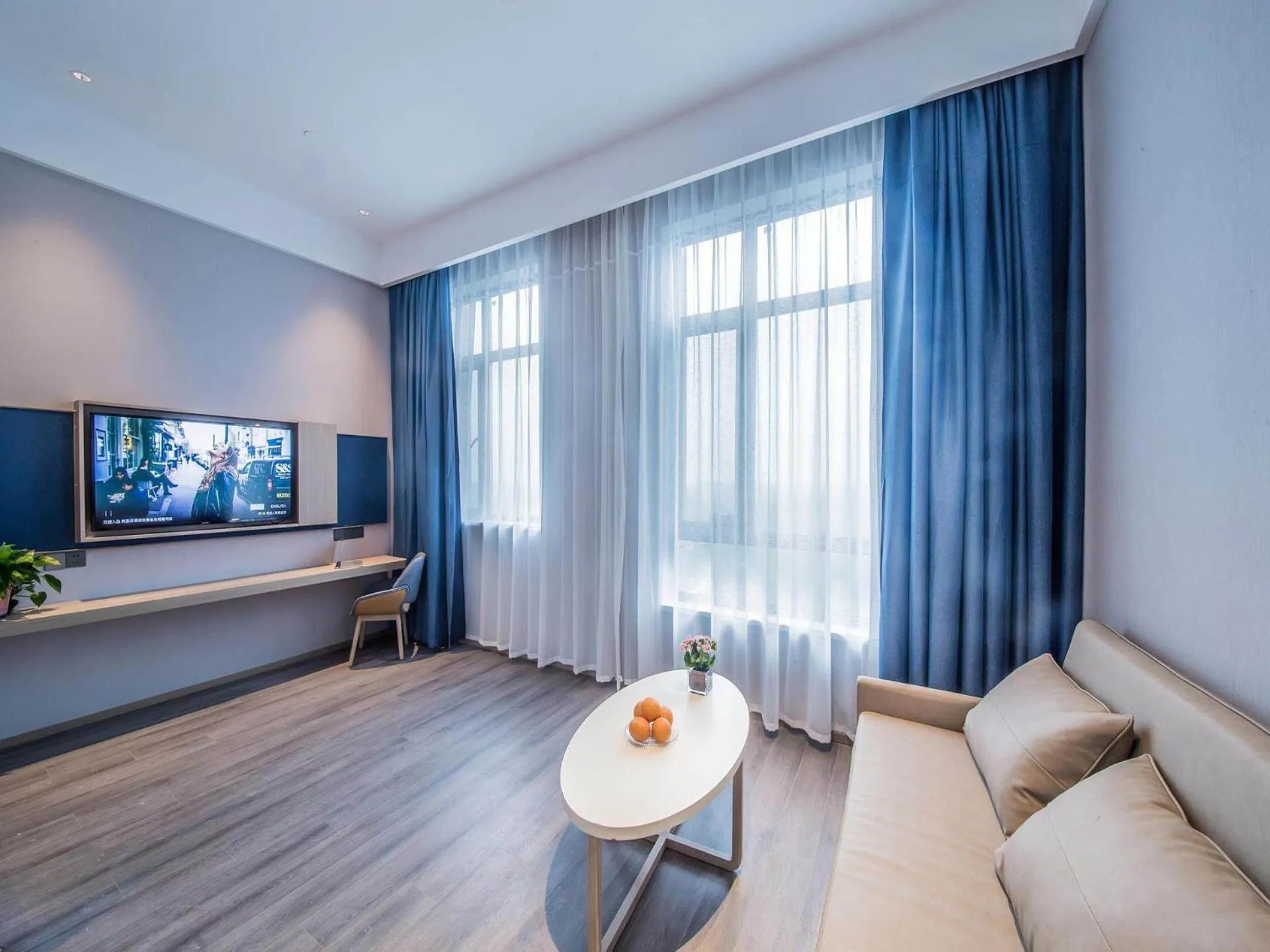 Bed in Kyriad Marvelous Hotel Qinhuangdao Nandaihe