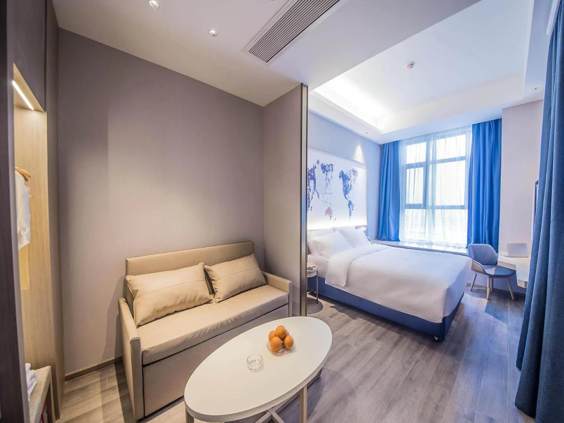 Bed in Kyriad Marvelous Hotel Qinhuangdao Nandaihe