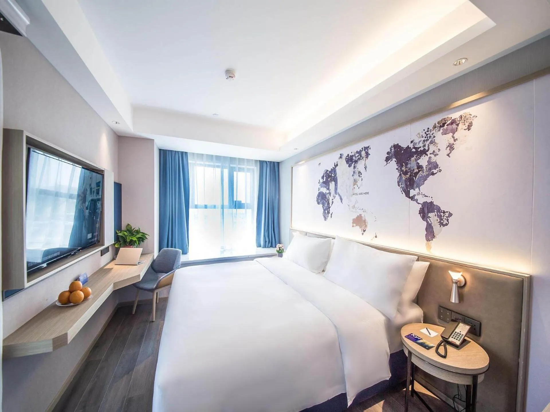 Bed in Kyriad Marvelous Hotel Qinhuangdao Nandaihe