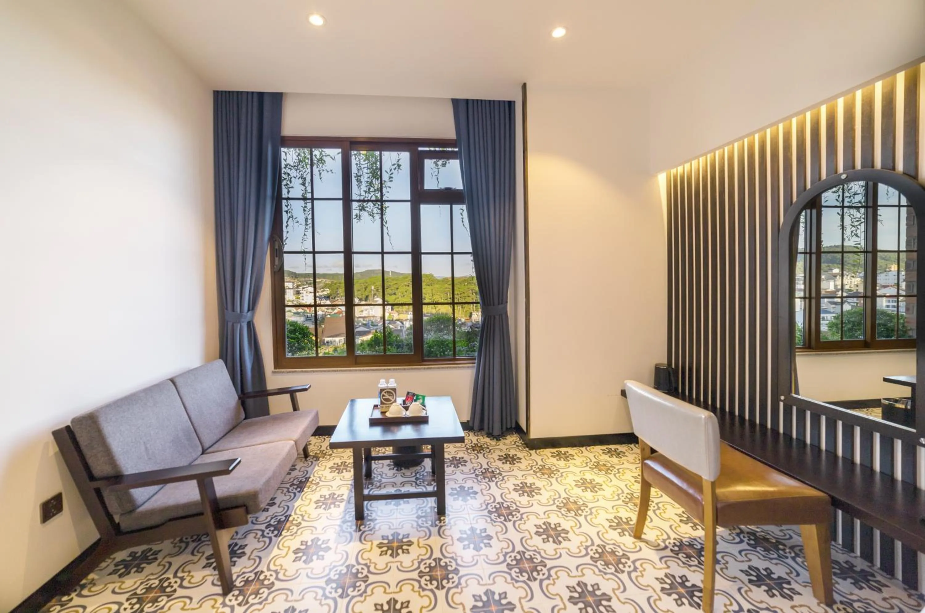 Seating area in Brick House Dalat Hotel