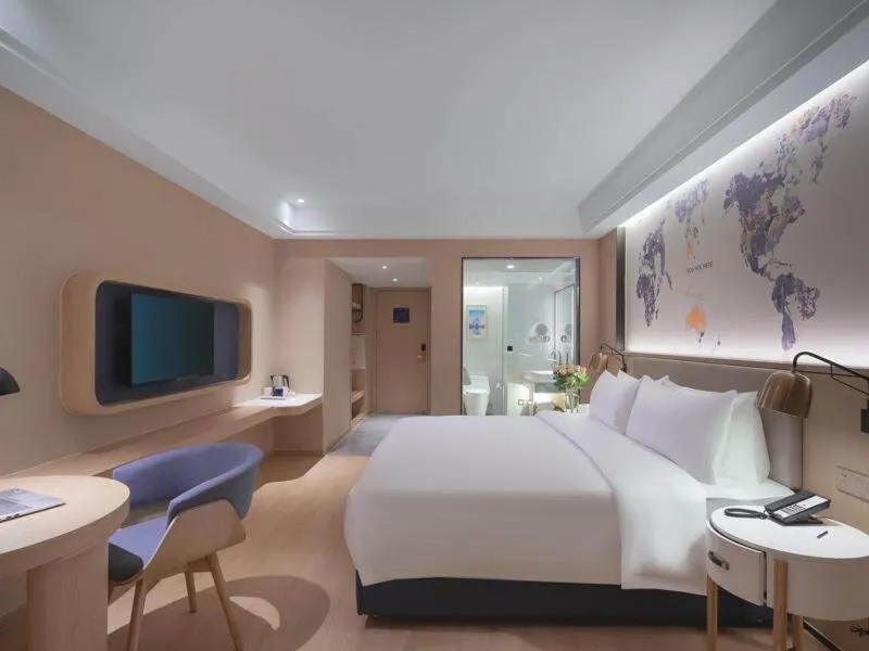 Bed in Kyriad Marvelous Hotel Suzhou Wujiang People Square