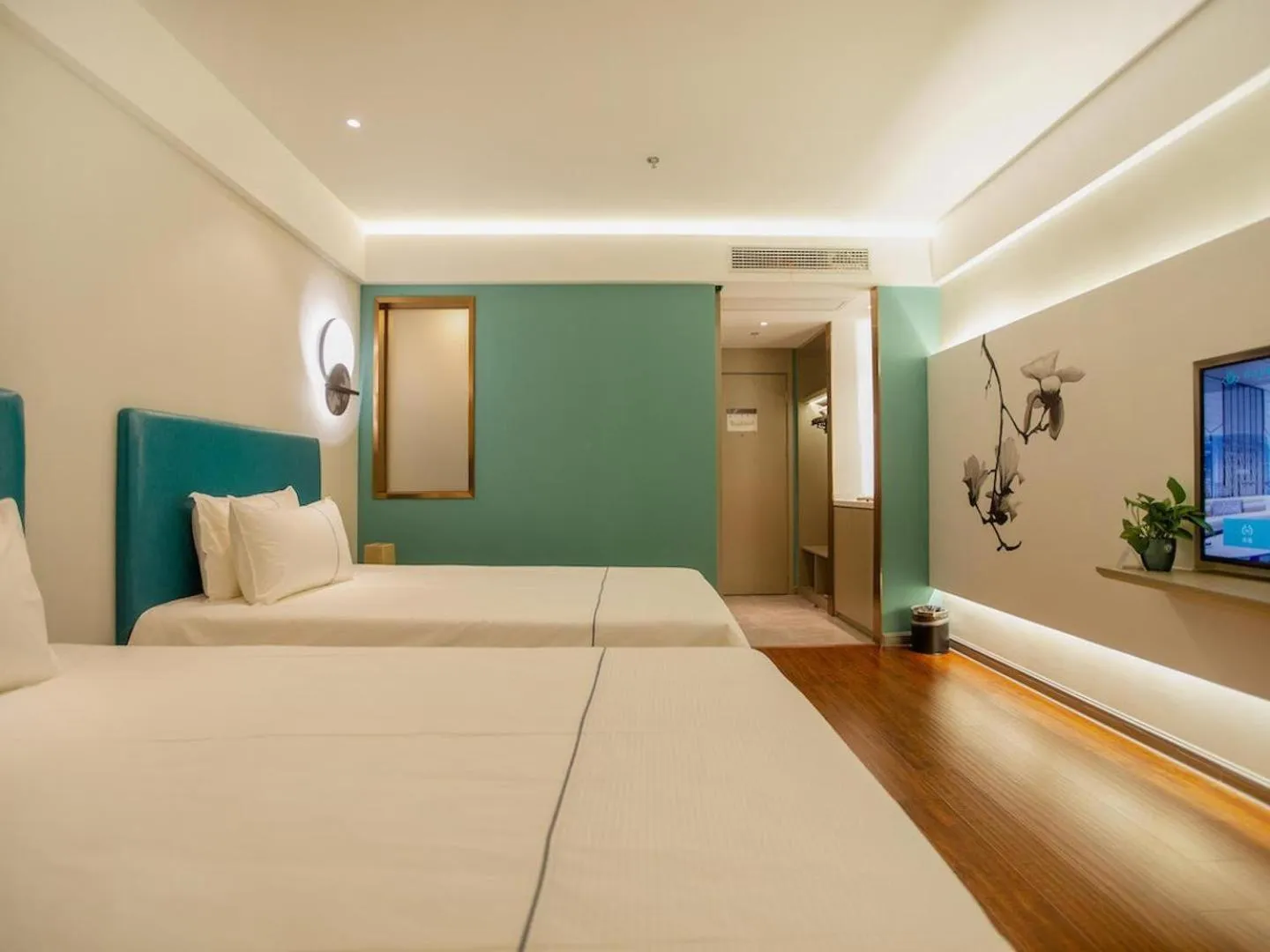 Bed in Magnotel Hotel Yangzhou Jinghua Wangyue Road